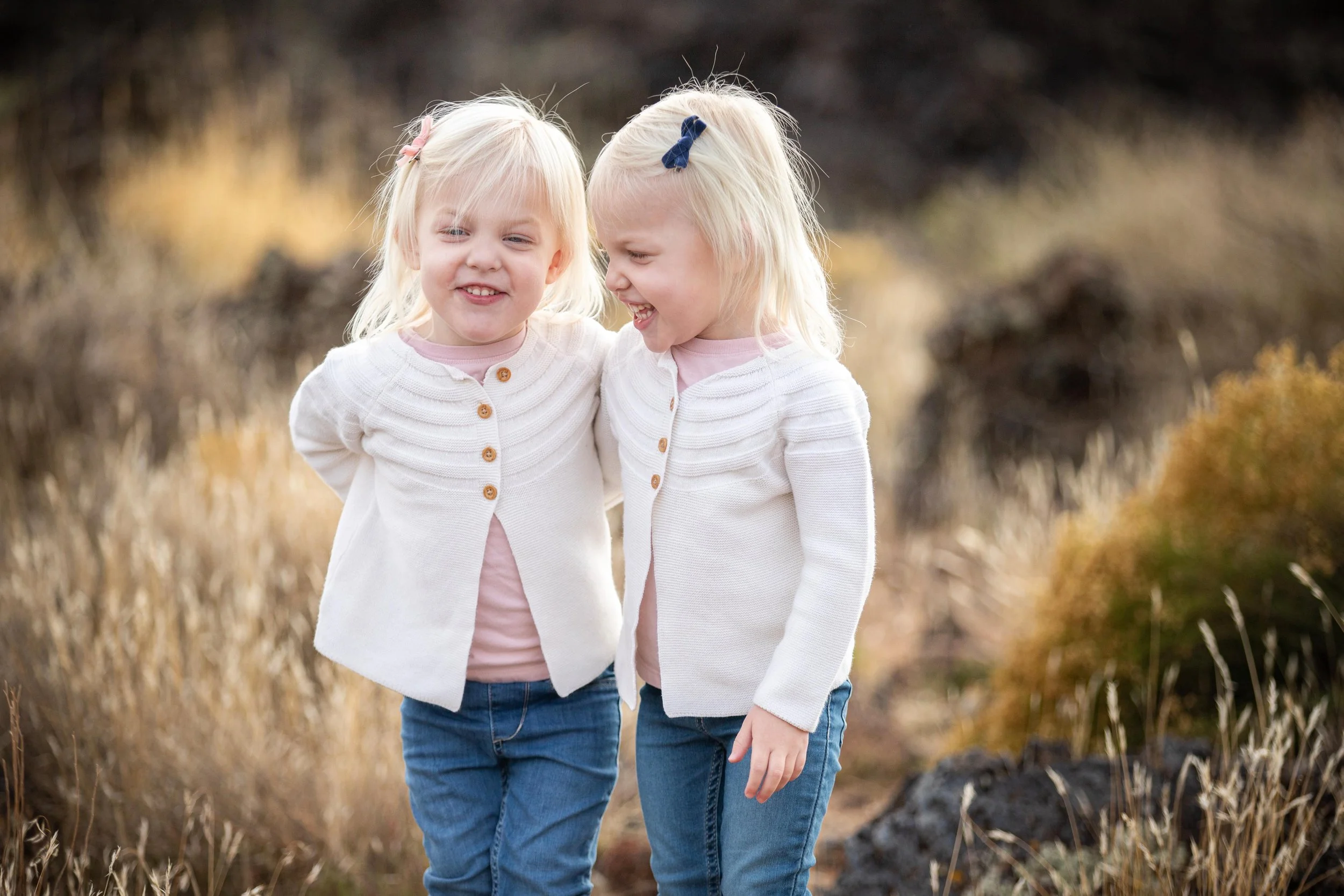 Sisters hugging during their portrait session in St. George Utah