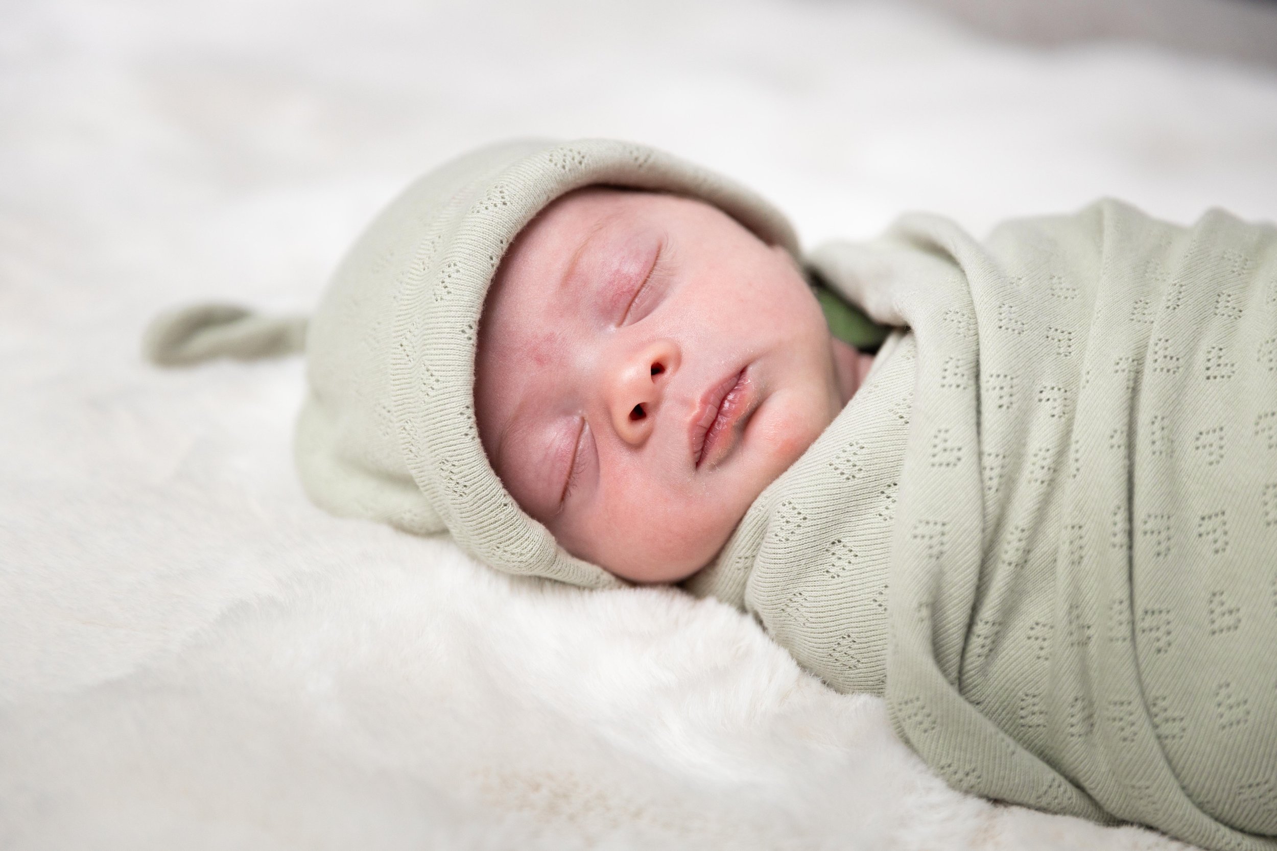 Newborn photographer in St. George Utah, St. George lifestyle newborn photography, In-home newborn session Southern Utah, Best newborn photographer St. George, Natural light newborn photographer in Utah, Affordable newborn photo session St. George
