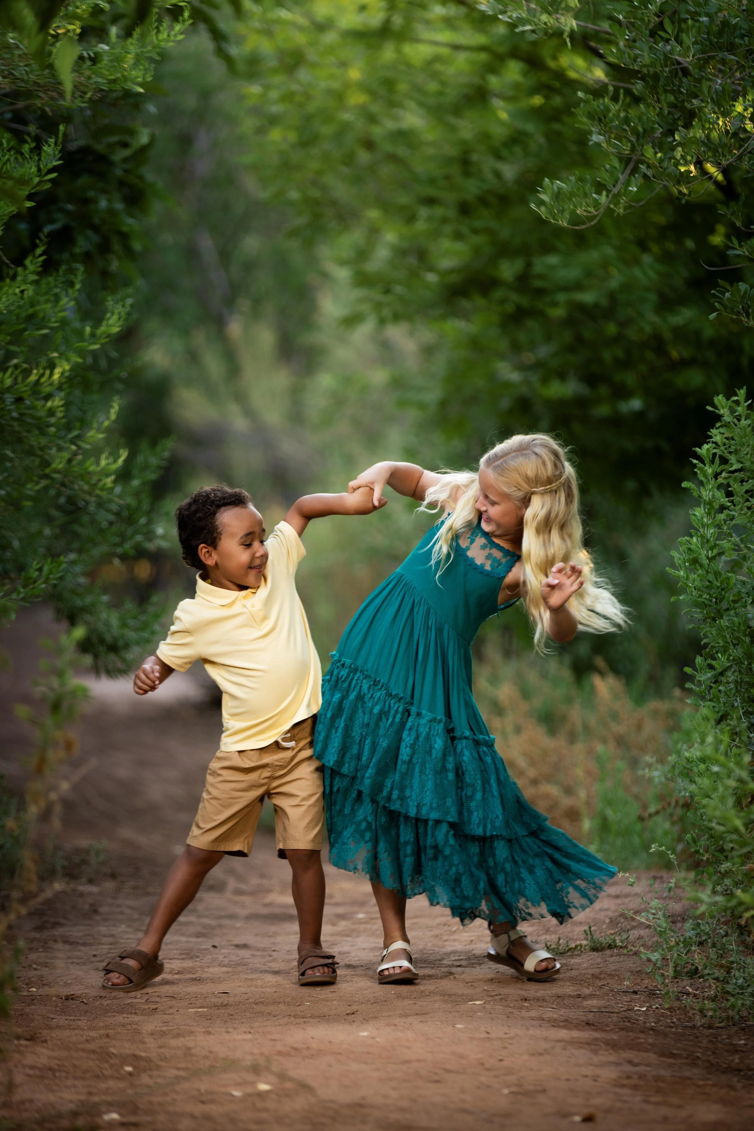Kids having fun during family photoshoot at the Tonaquaint Nature Center.