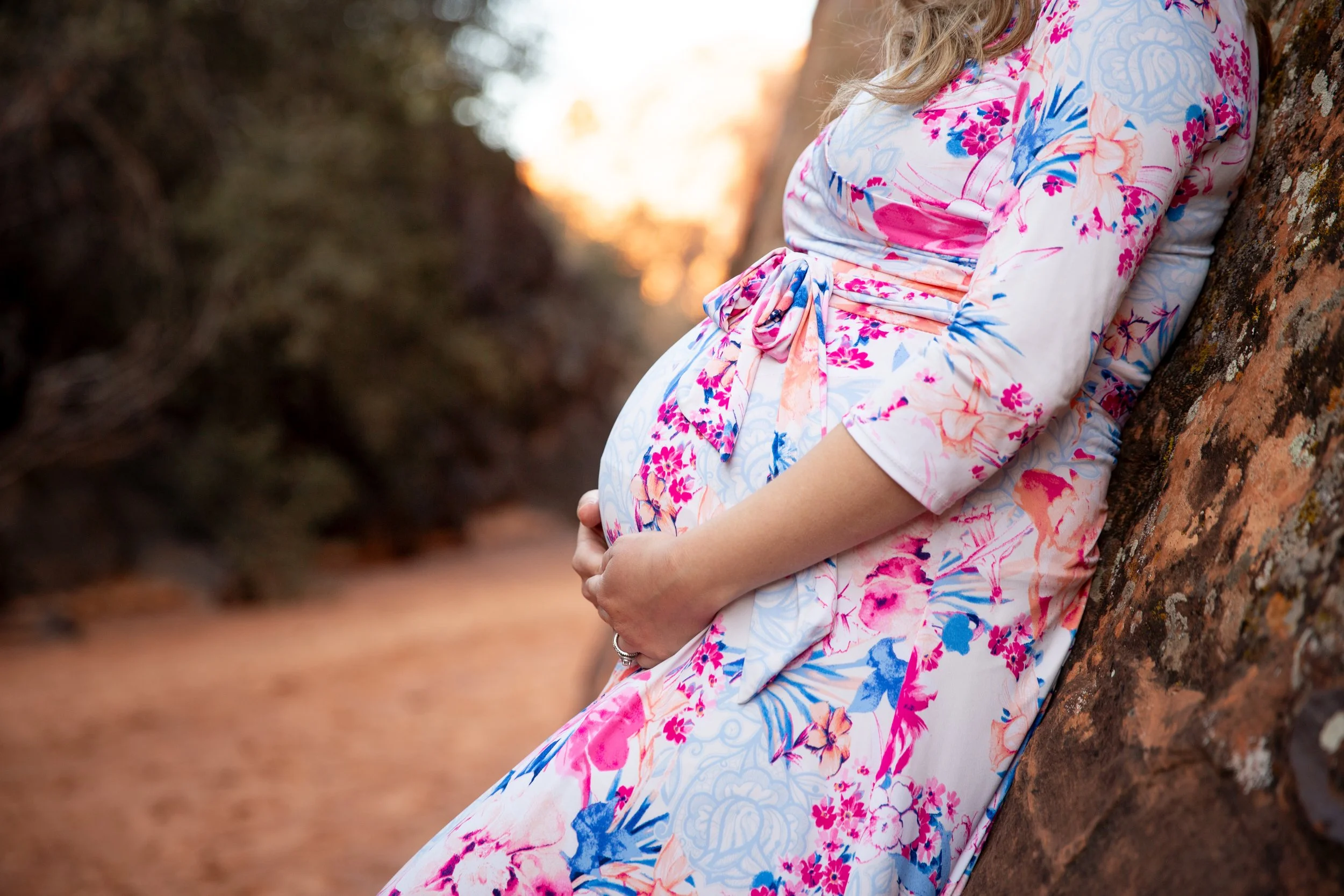 Pregnant women posing during maternity photo shoot in St. George Utah