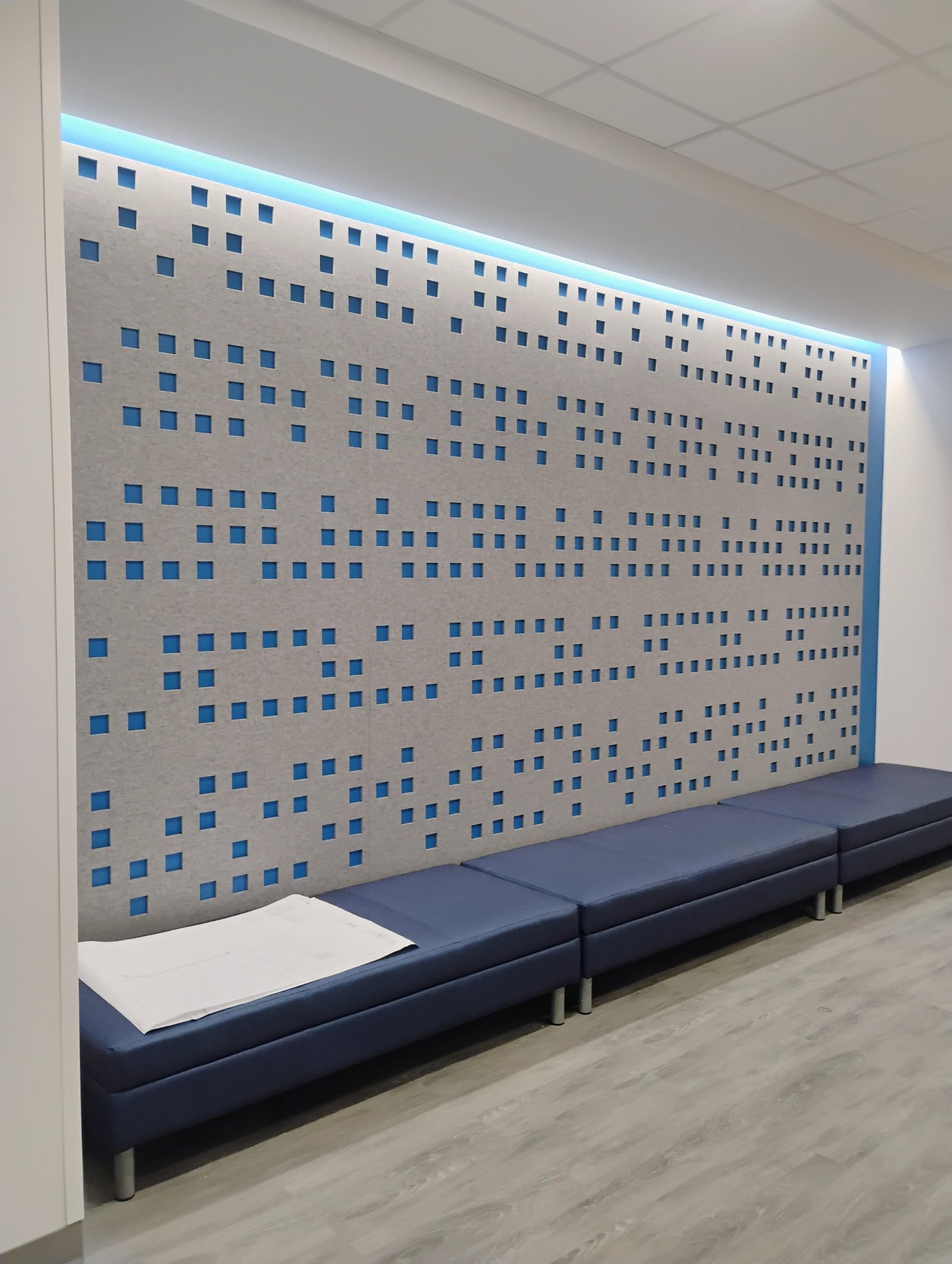 Concrete wall with reflective paneling