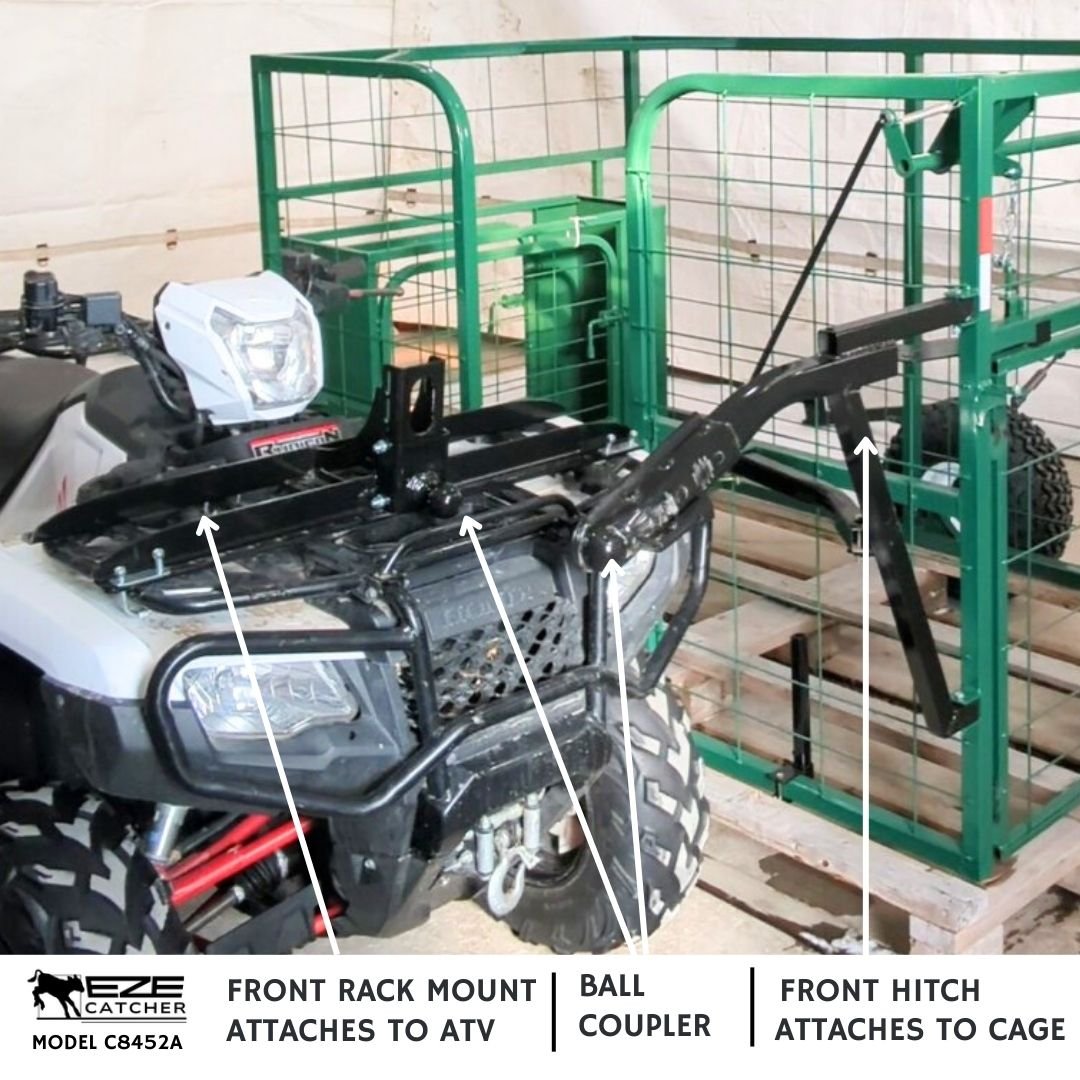 An eze-catcher calf catcher with front rack mount hitch and ball coupler attached to an ATV