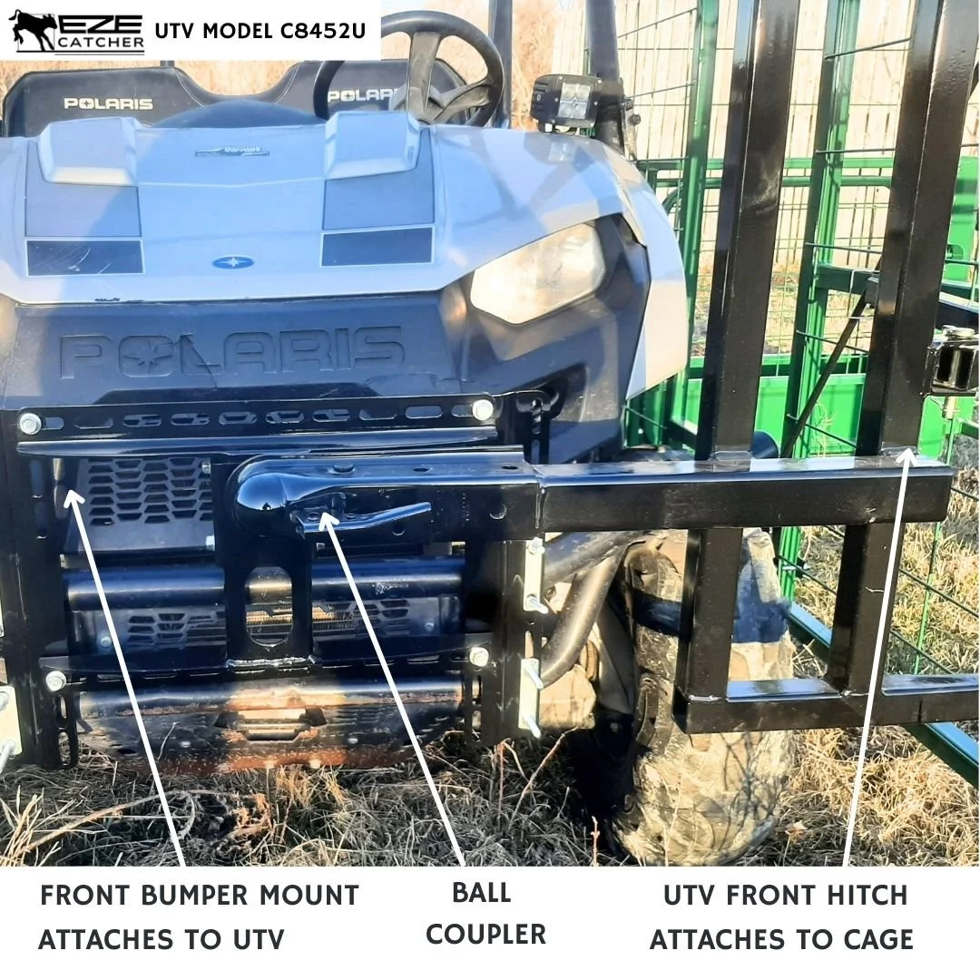An UTV being hooked up with a ball coupler mount to a calf catcher cage