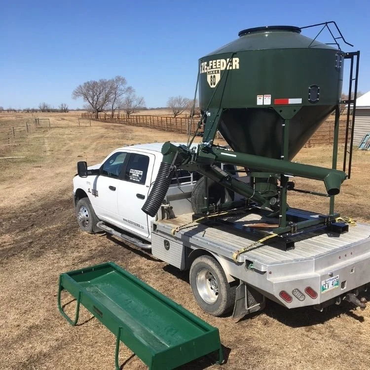 MIXER 80 WITH FOLDING AUGER & SPOUT EXTENSION