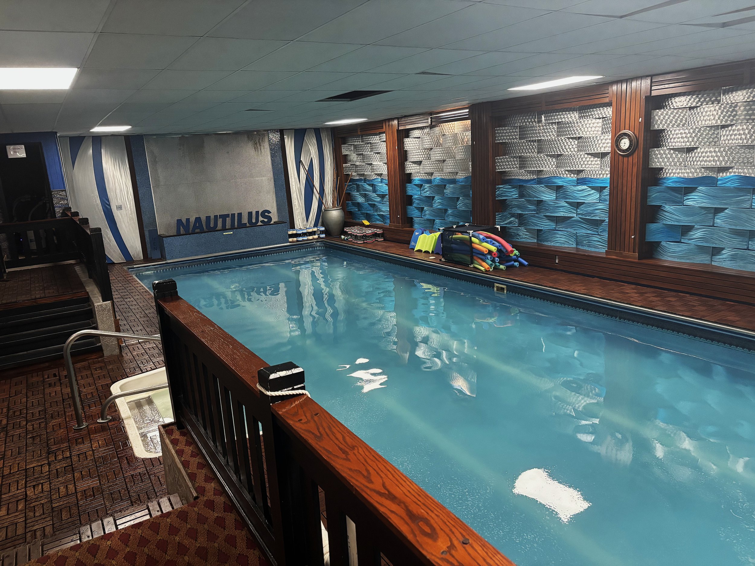 Wet room with swimming pool in foreground