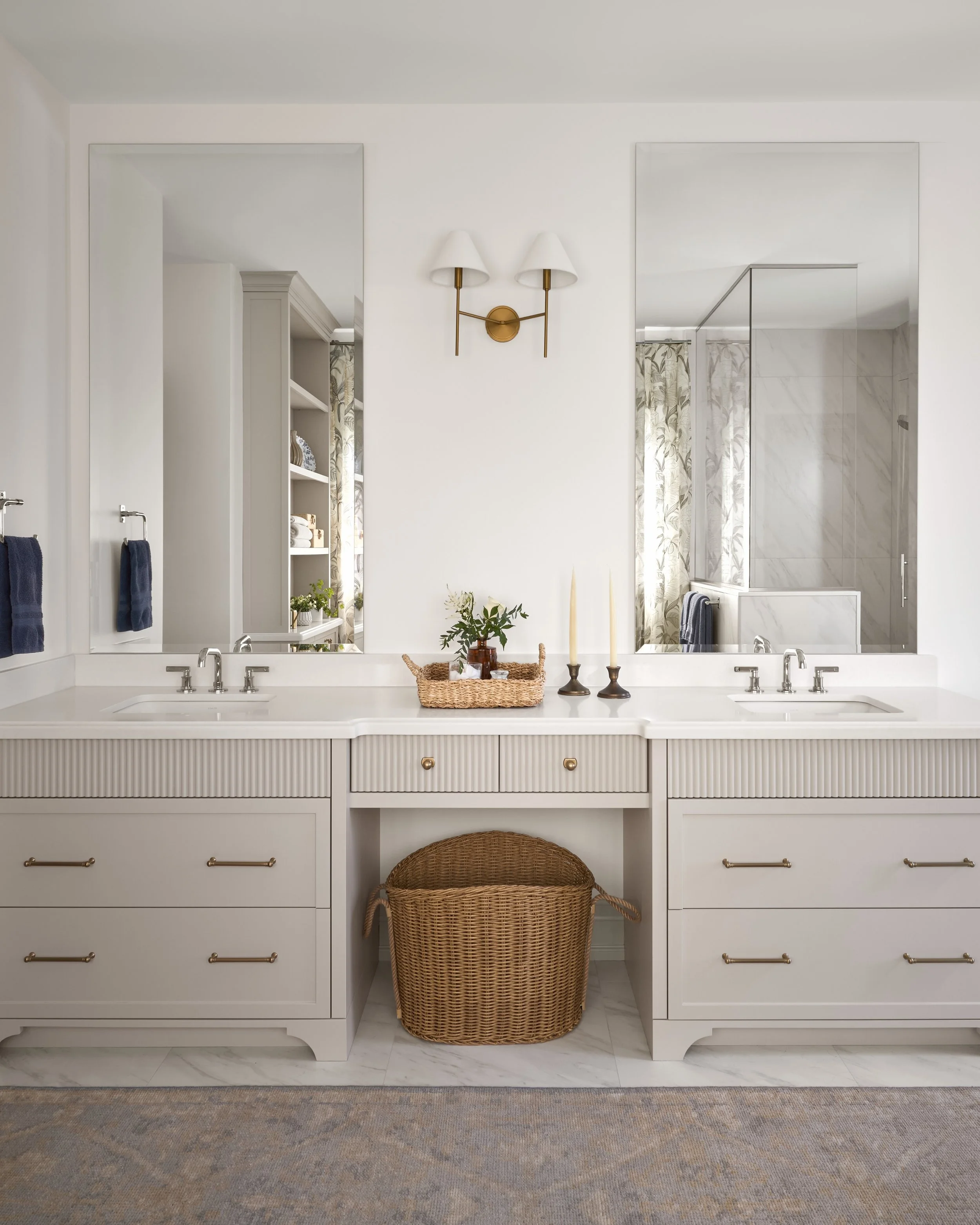 A little more room for the morning routine.

The primary ensuite at Holroyd pairs a generous double vanity with soft neutrals and thoughtful storage. Fluted cabinetry adds texture, while brass hardware and lighting bring warmth alongside polished sil