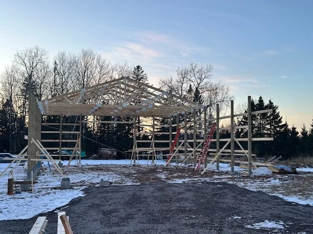 How Pole Buildings Are Framed: Step-by-Step from Dirt to Dried-In