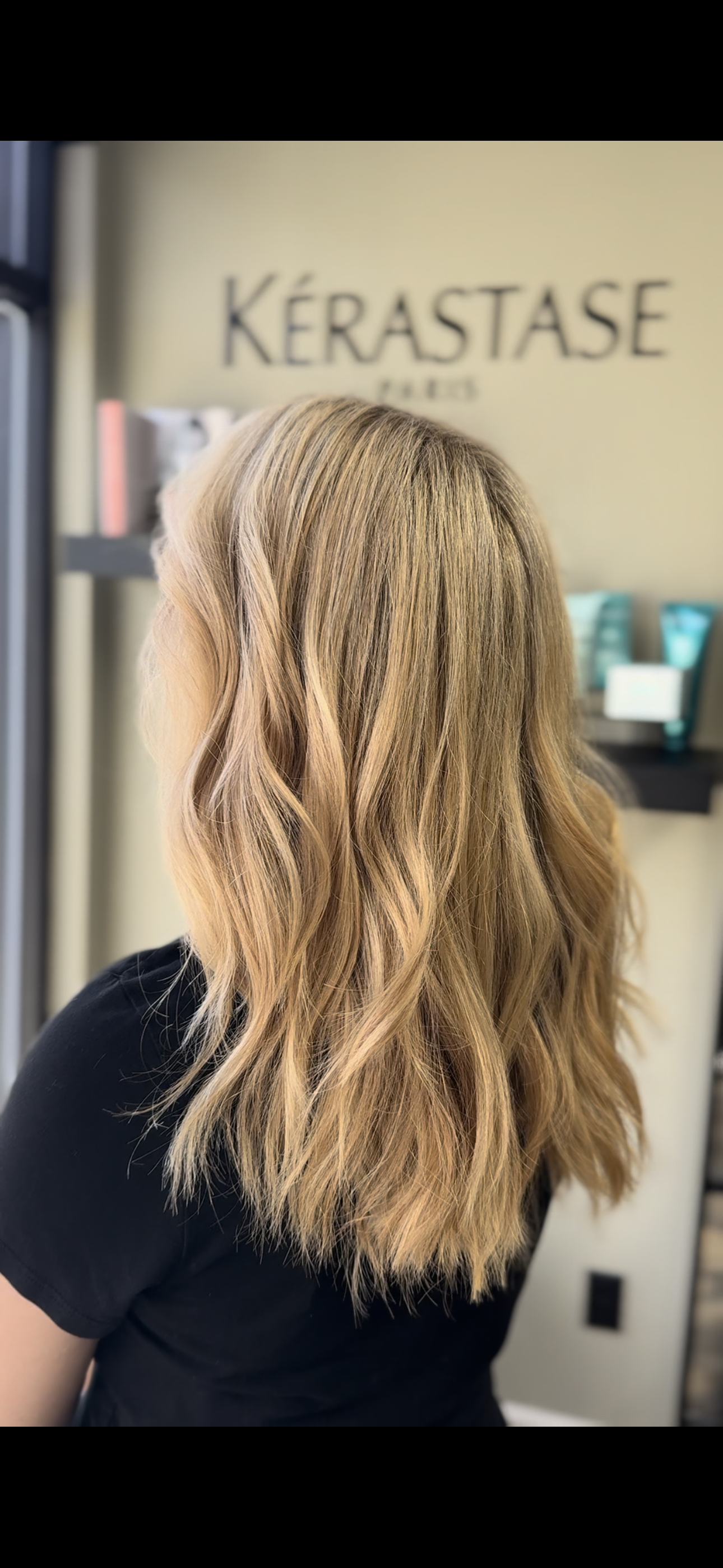 Long blonde hair with soft waves