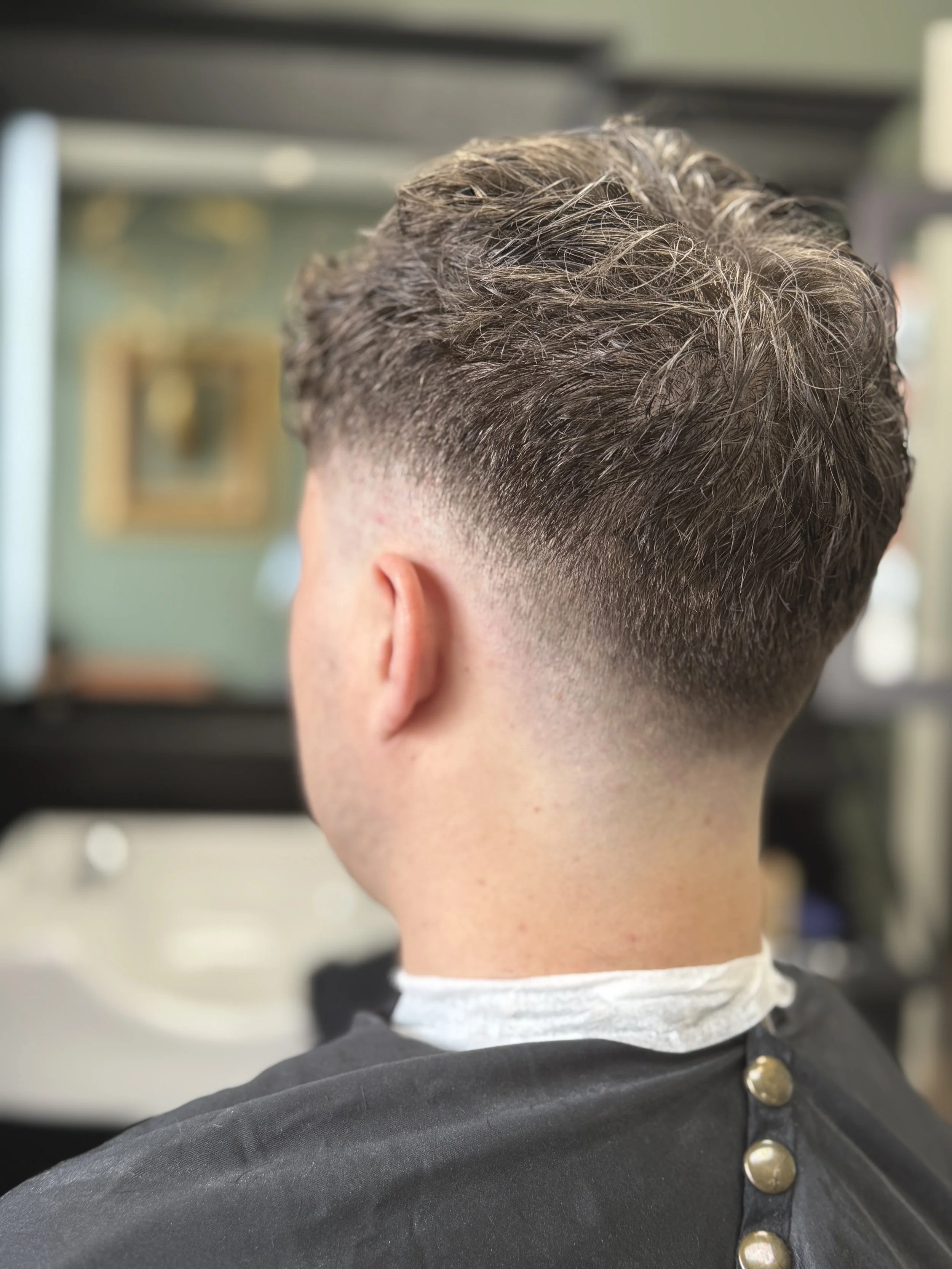 Man with drop fade haircut