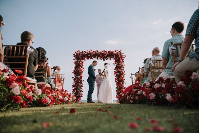 looking down the aisle of a bali wedding