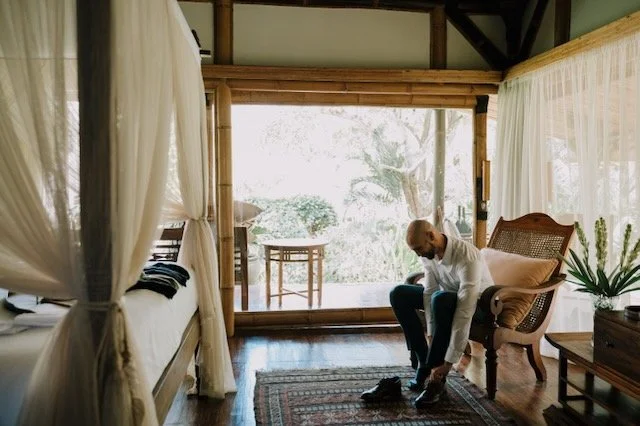 groom wedding preparation bedroom