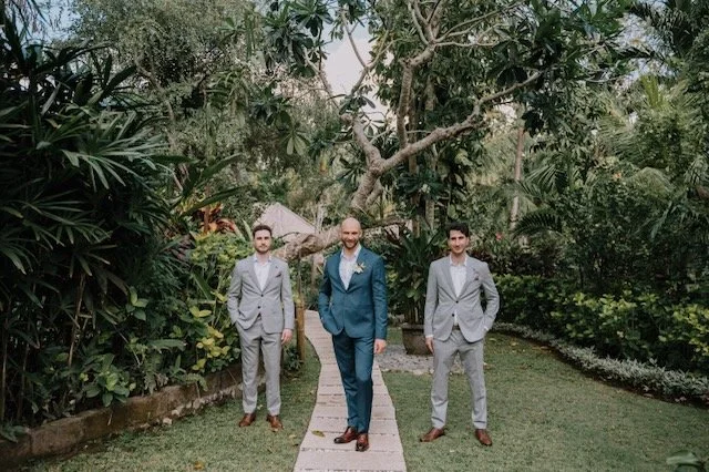 groom groomsmen tropical garden