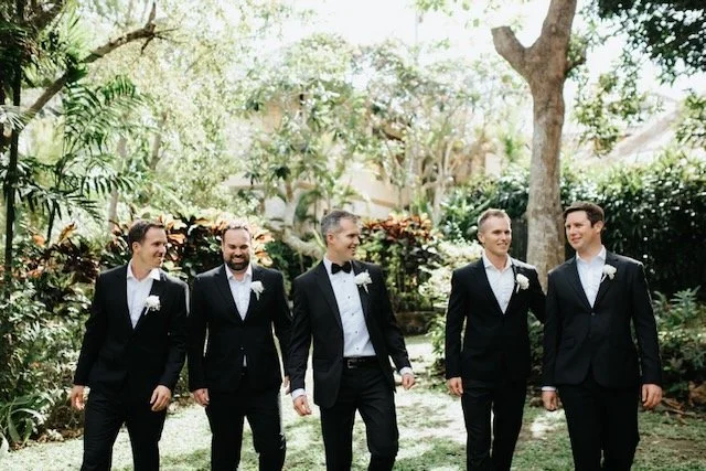 groom groomsmen tropical wedding venue