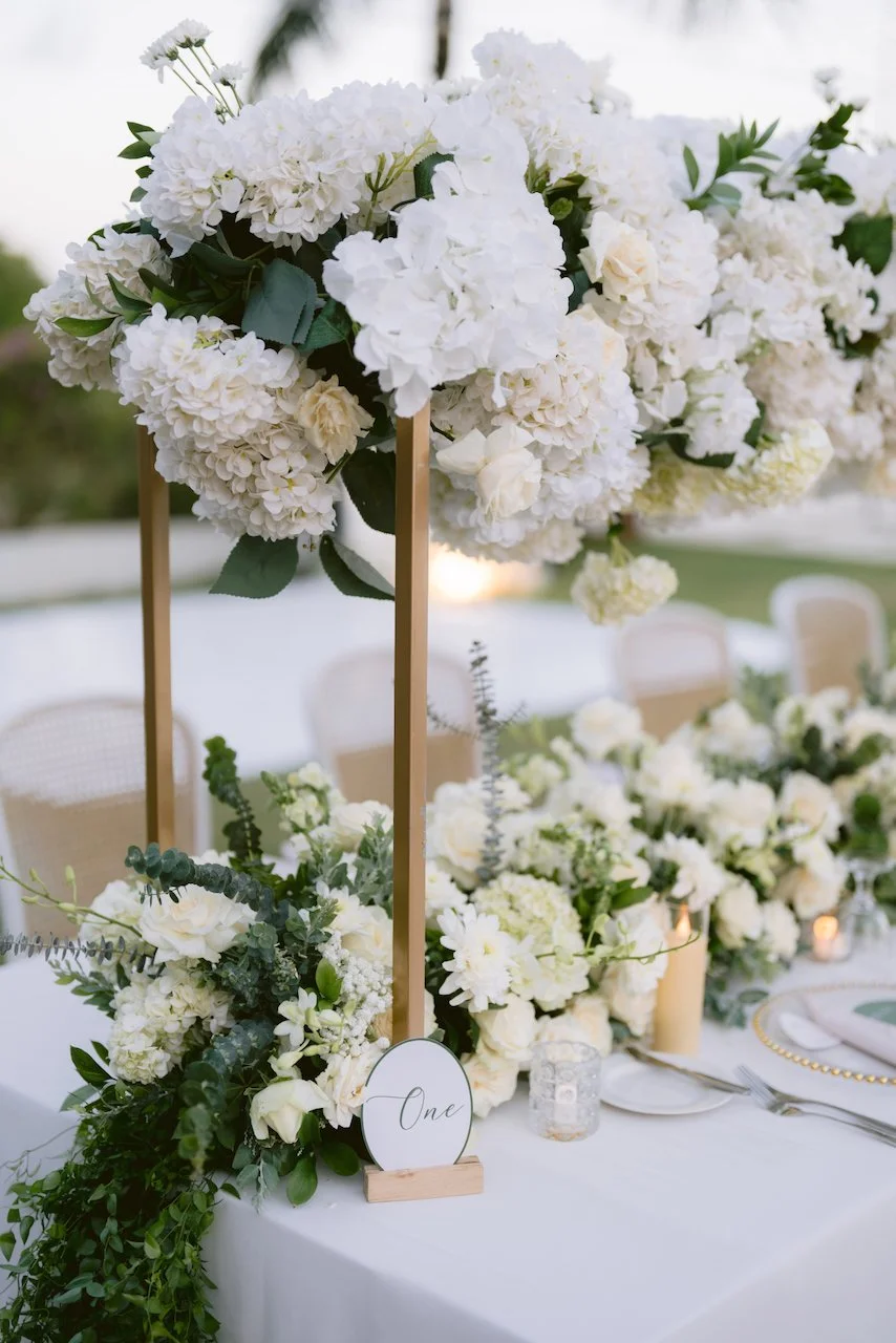 White floral wedding table centerpiece styling at Surga Estate reception