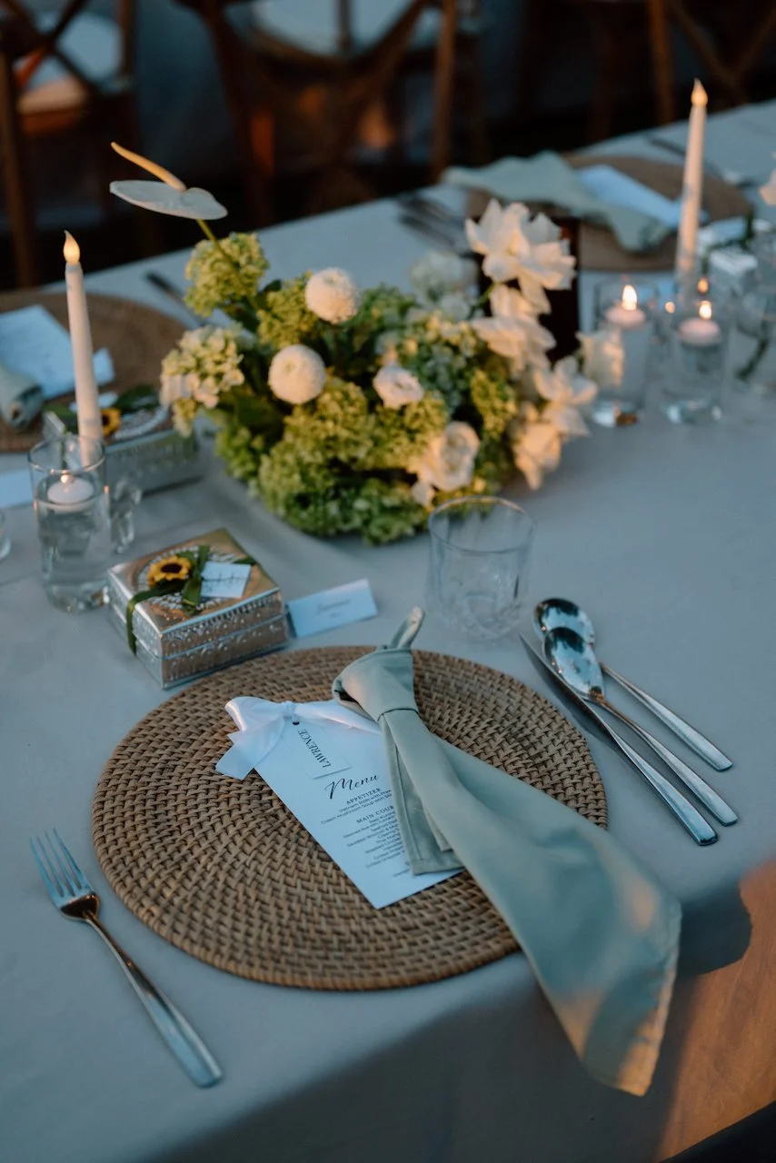 Elegant outdoor reception table setting with a sunflower accent in Bali.