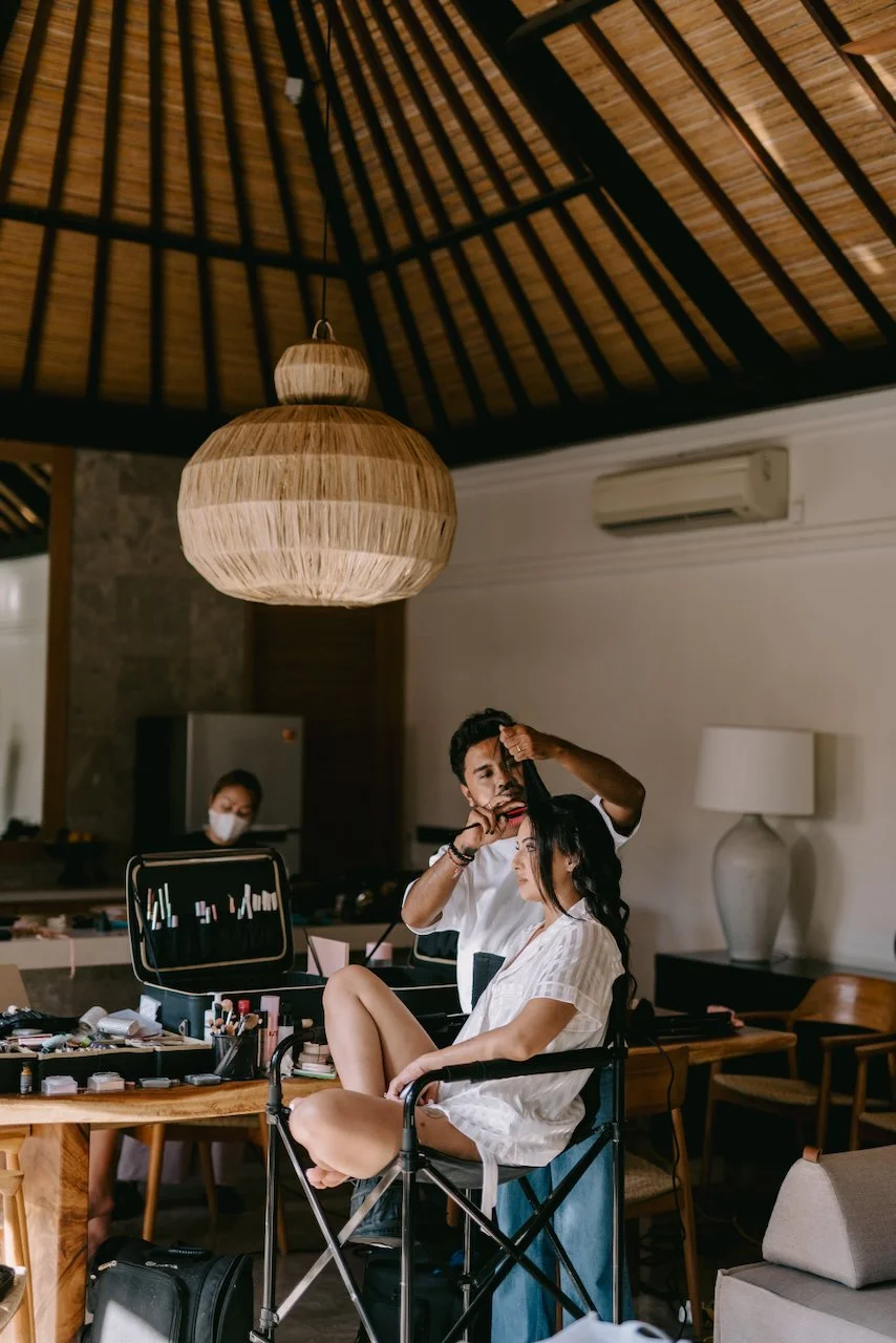 Bride having her hair and makeup finished before her Peppers Seminyak wedding.