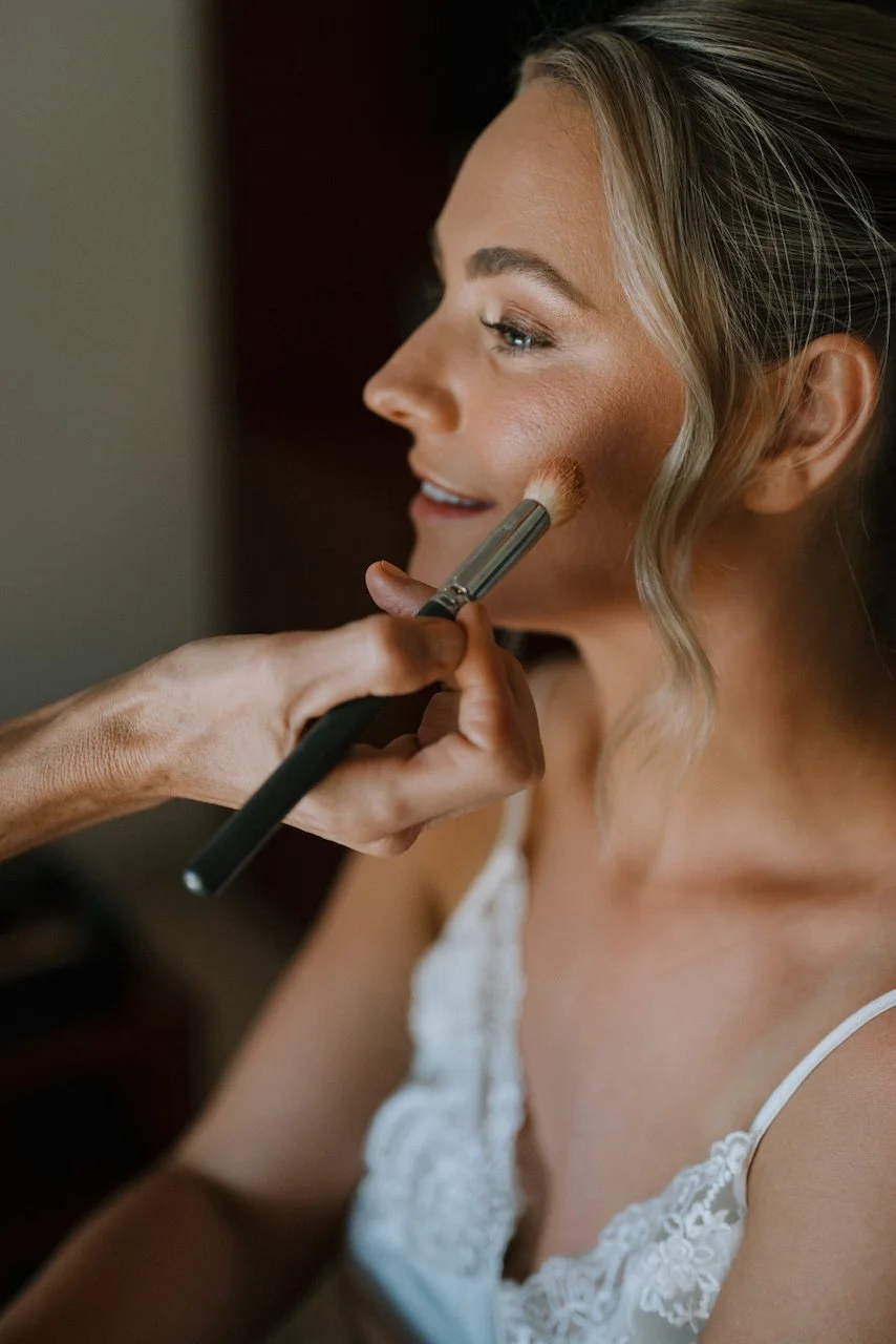Close up of bride Tegan having bridal makeup applied before her Uluwatu wedding