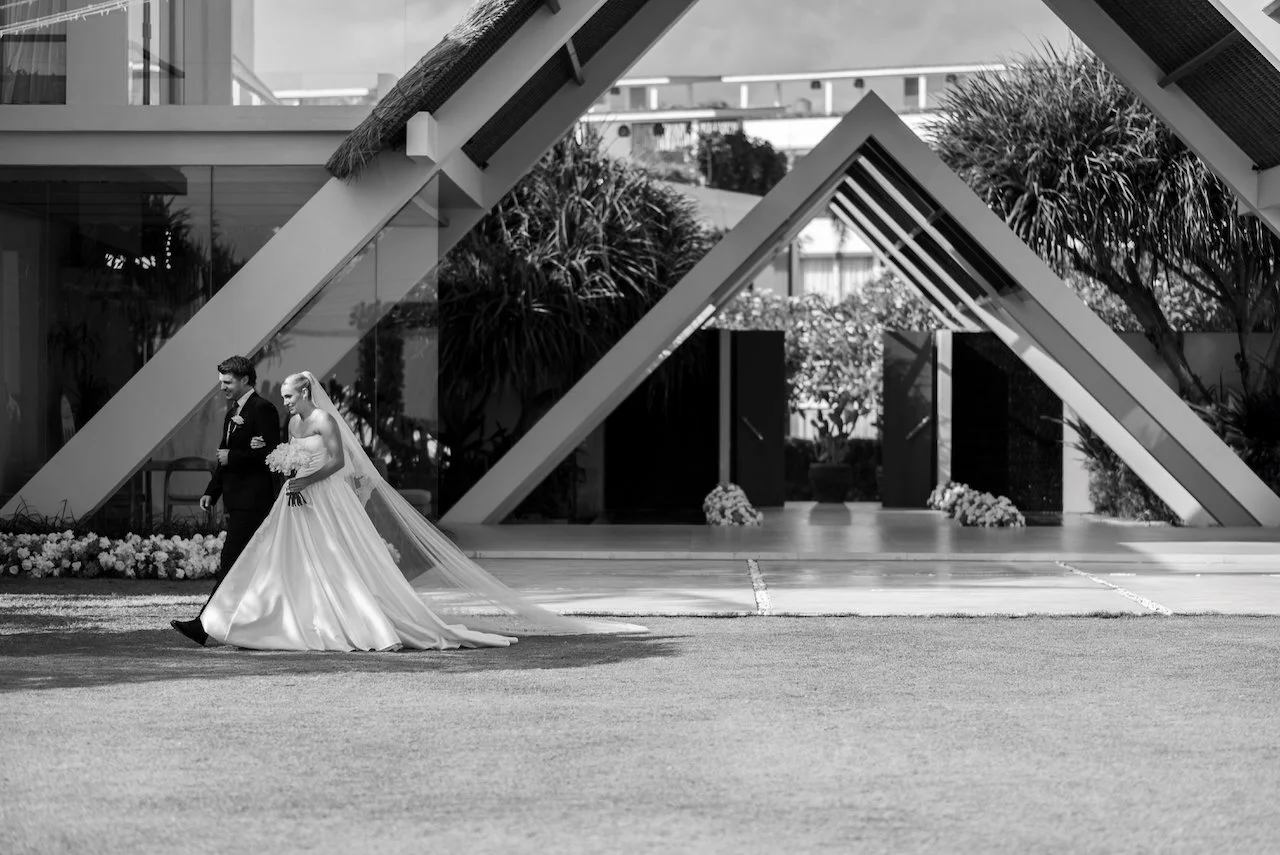 Bride standing outside the wedding pavilion