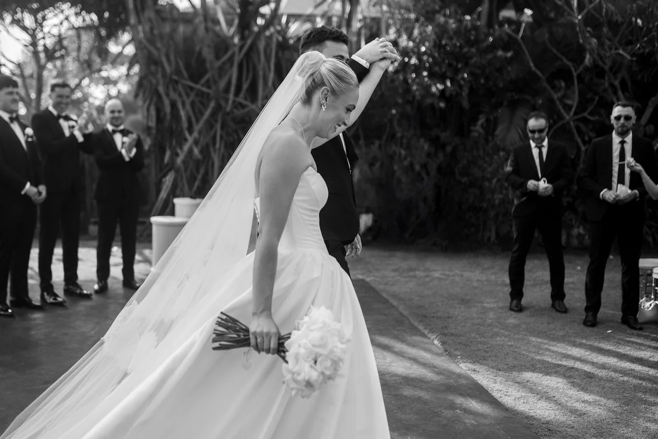 Bride walking down the aisle during the ceremony