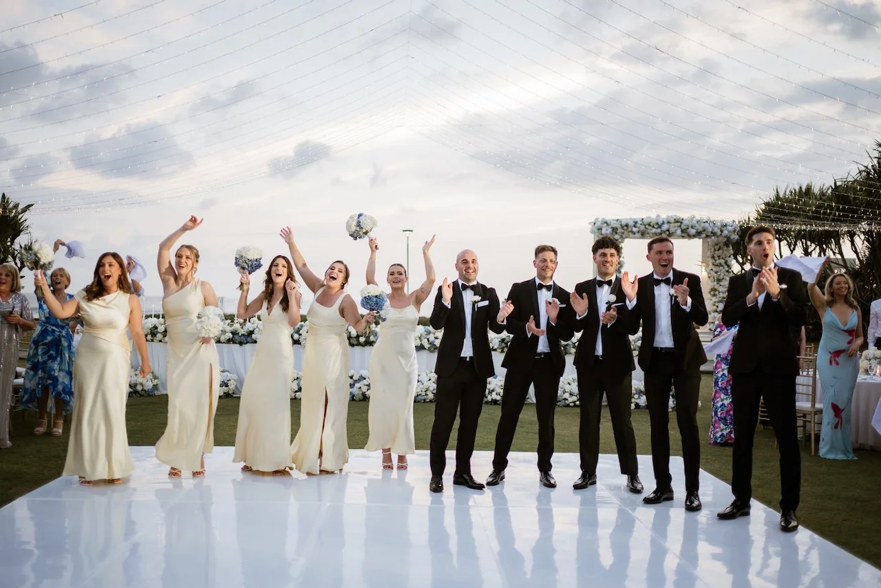 Wedding party celebrating together after the ceremony