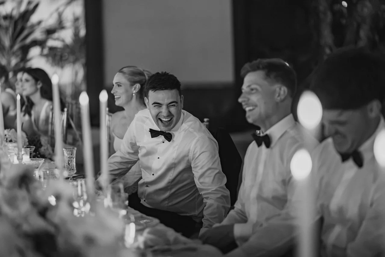 Wedding guests enjoying dinner at the reception