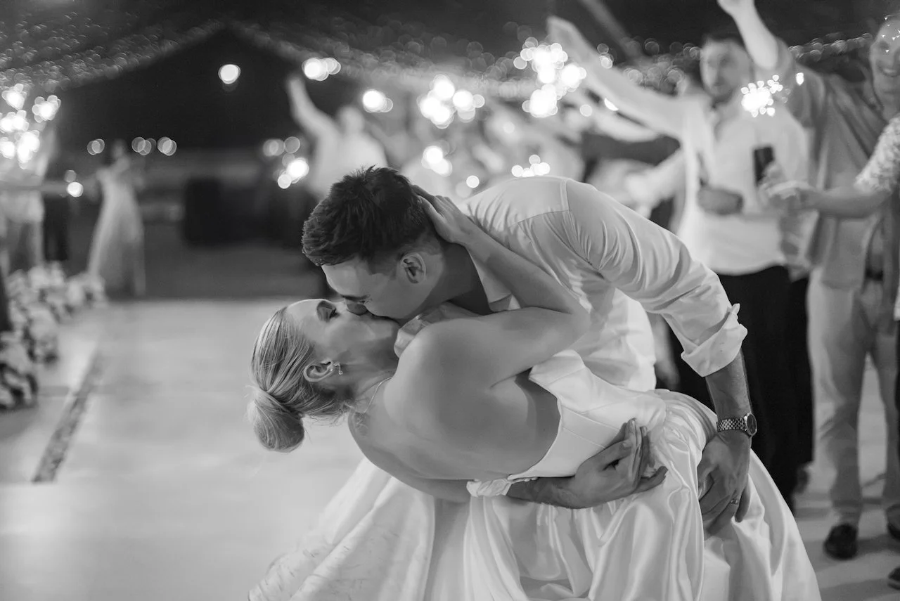 Bride and groom sharing a dip on the dance floor