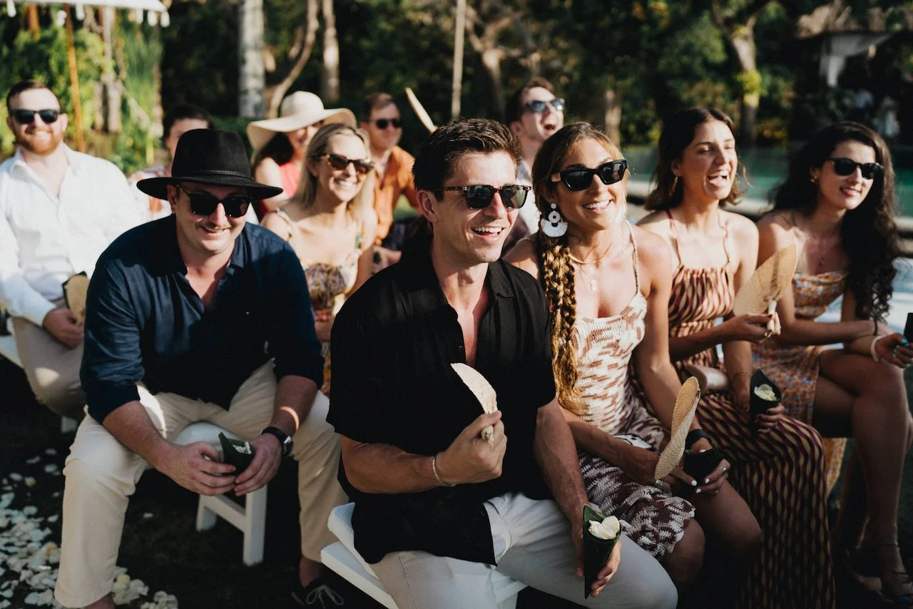Guests enjoying an outdoor Bali wedding ceremony planned by a boutique Bali wedding planner.