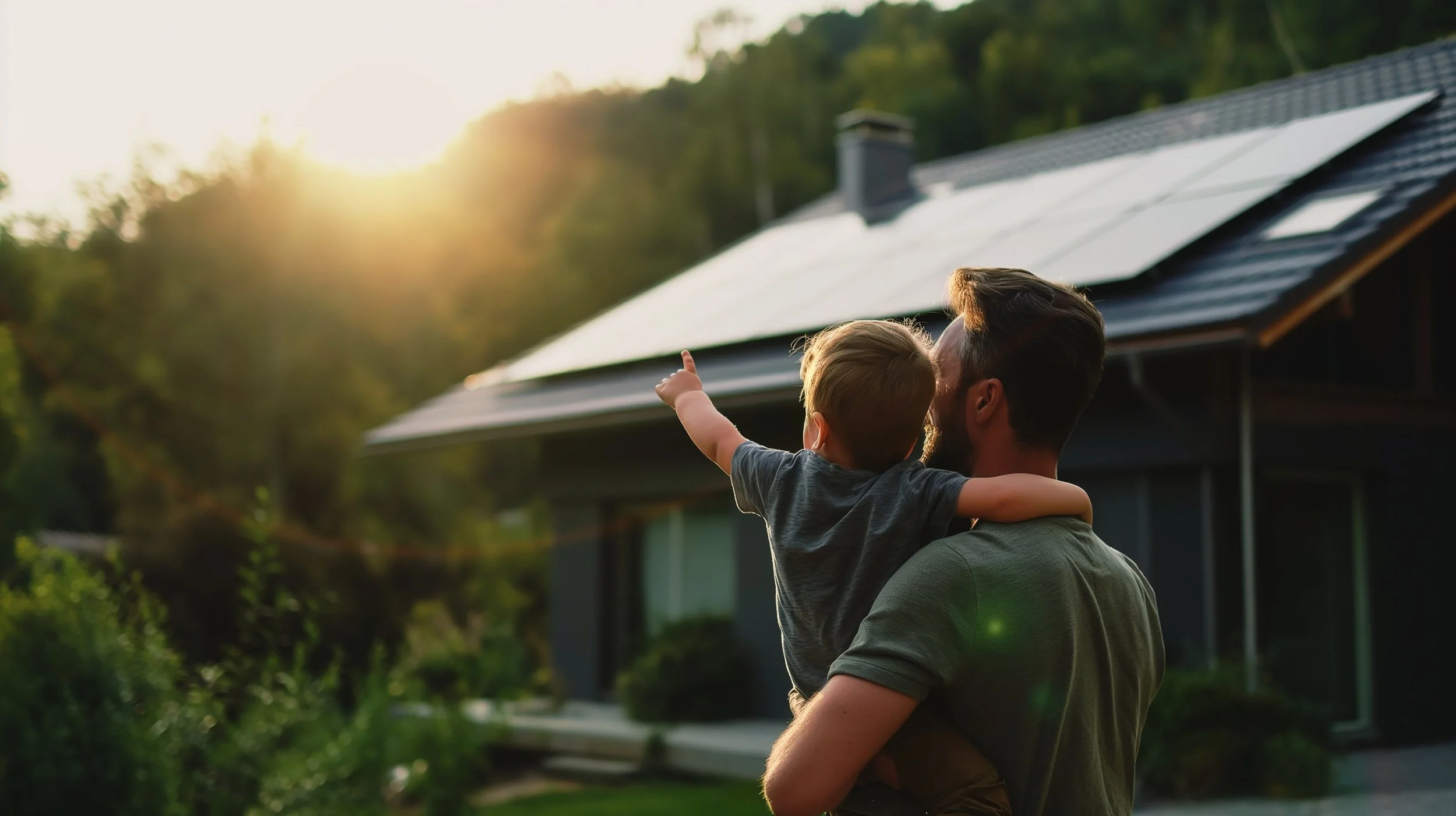 Father and Son Pointing at Solar Panels