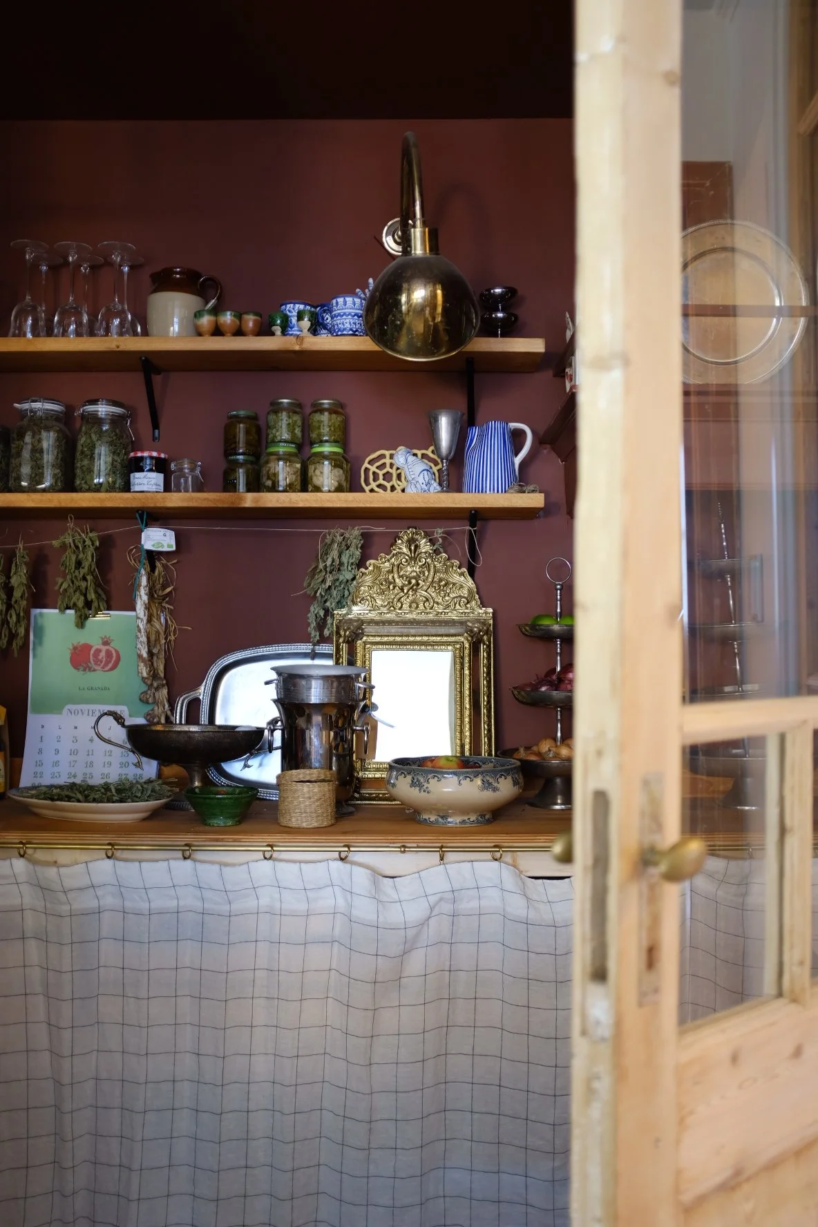 A pantry that displays everyday ceramics