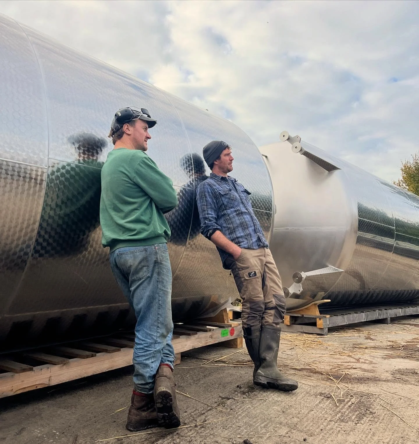 These apples are a serious business. Andy and Justin contemplating some stuck machinery today. Apples apples apples. 🍎 🍏