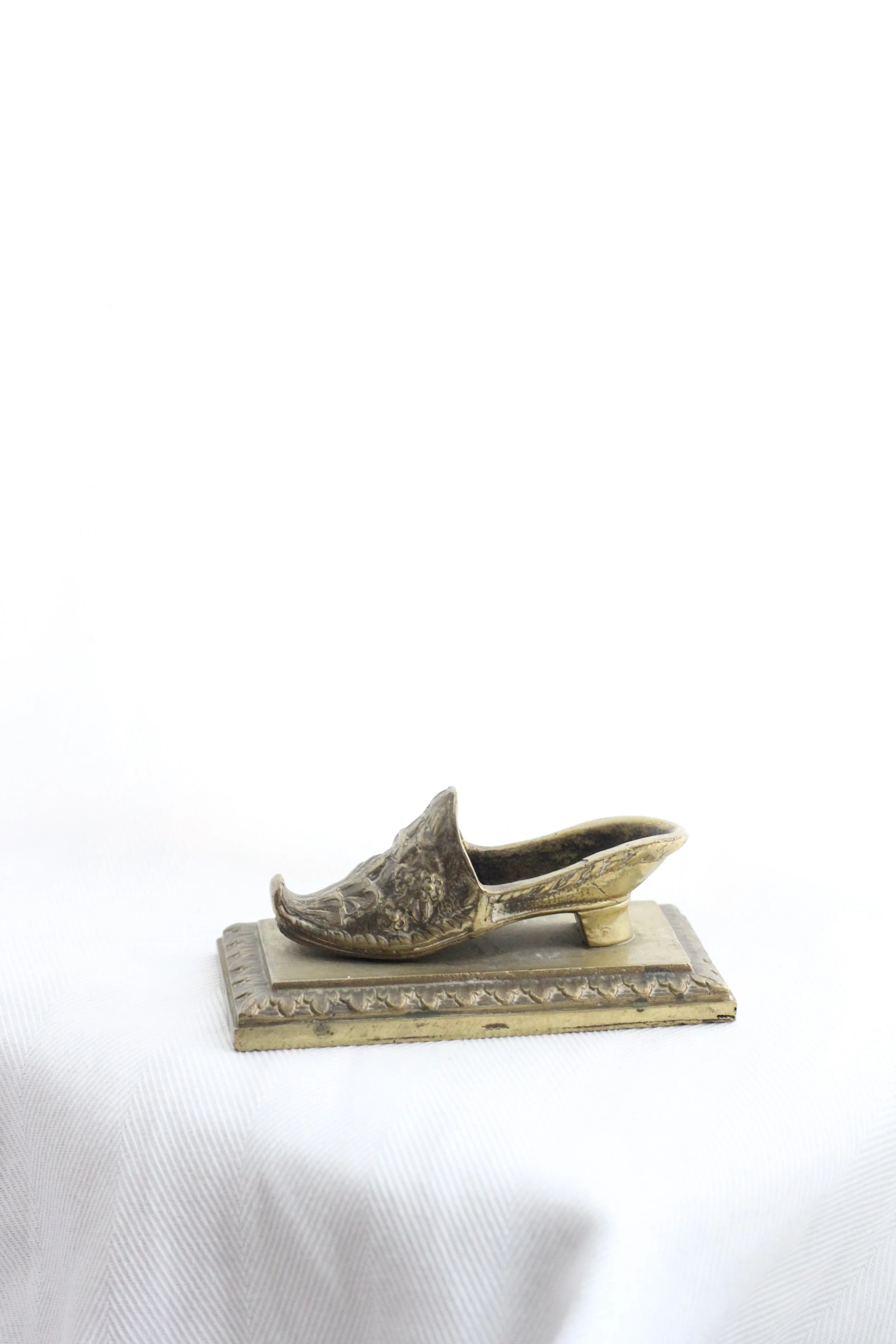 Vintage brass shoe paperweight
