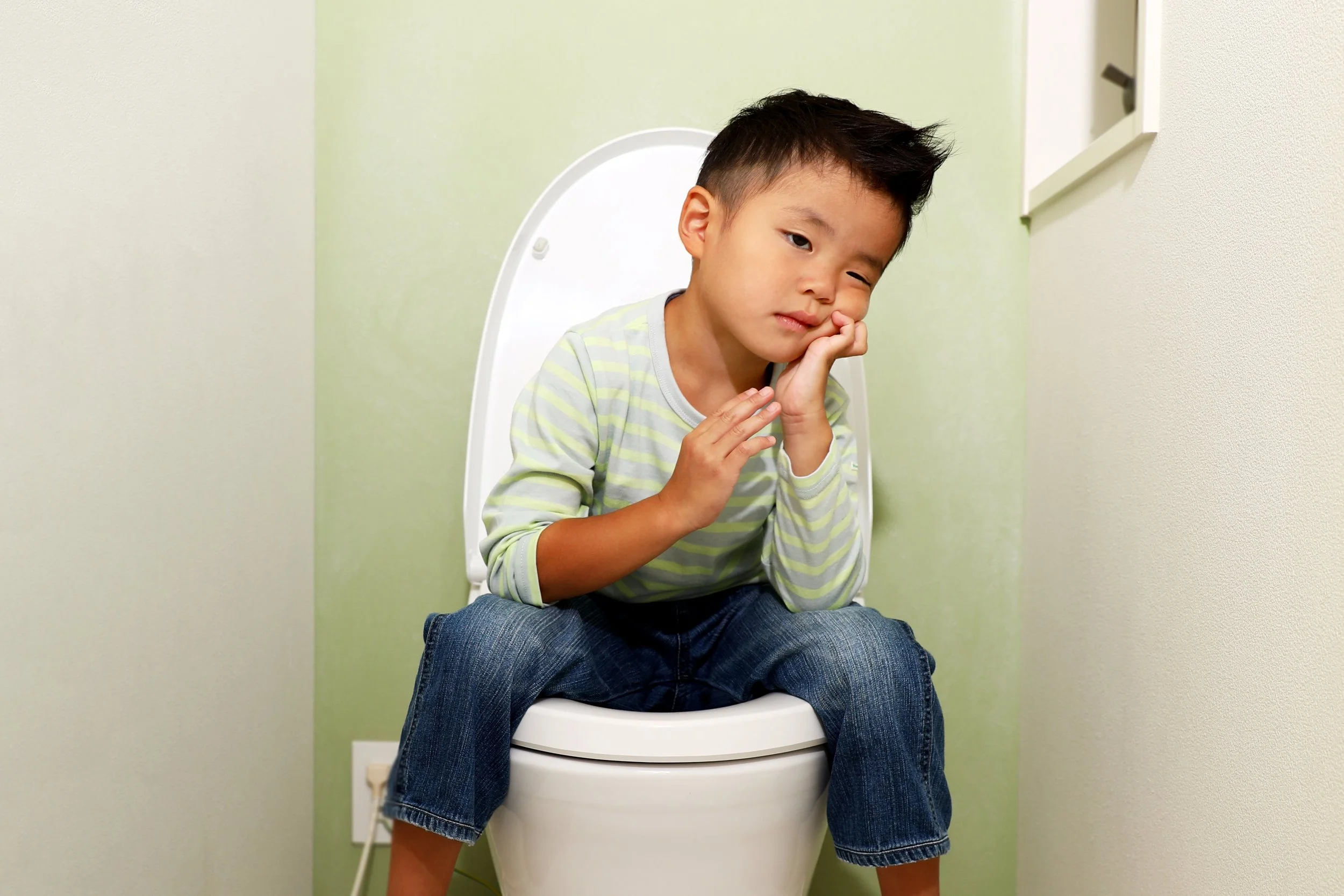 child-waiting-on-toilet.jpg