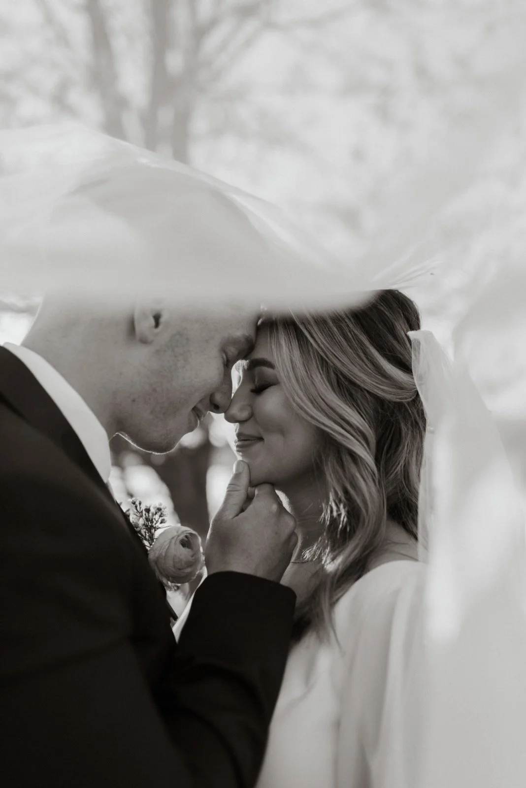 happy newly married couple about to kiss