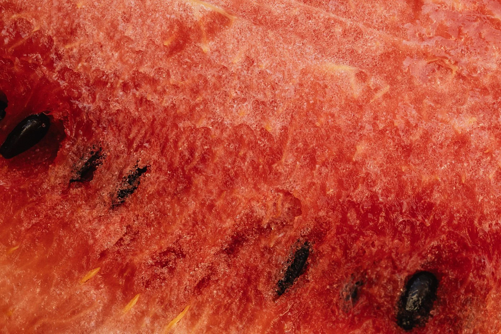 Macro photo of juicy watermelon slice.