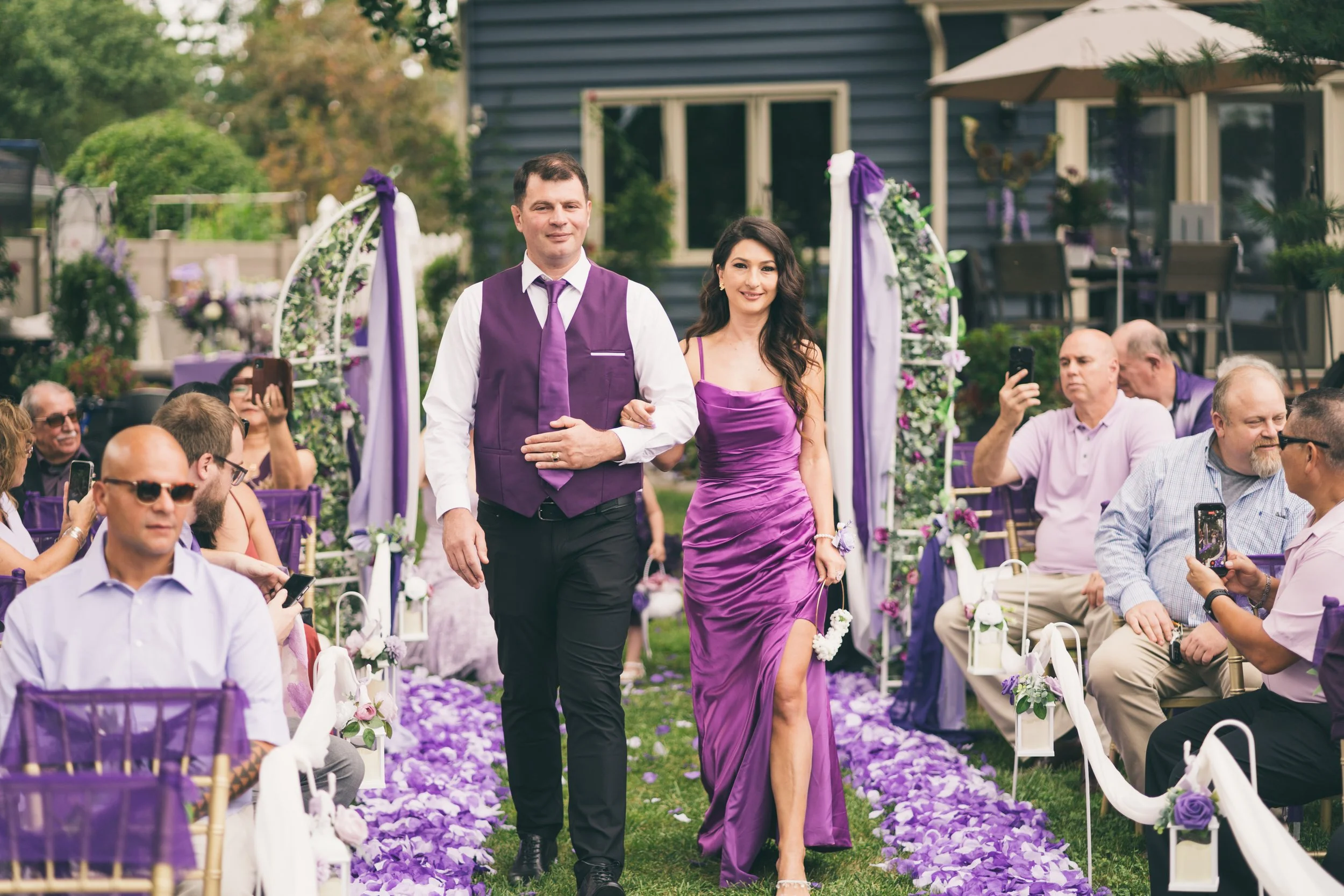 Bridesmaid and the groomsman walking in