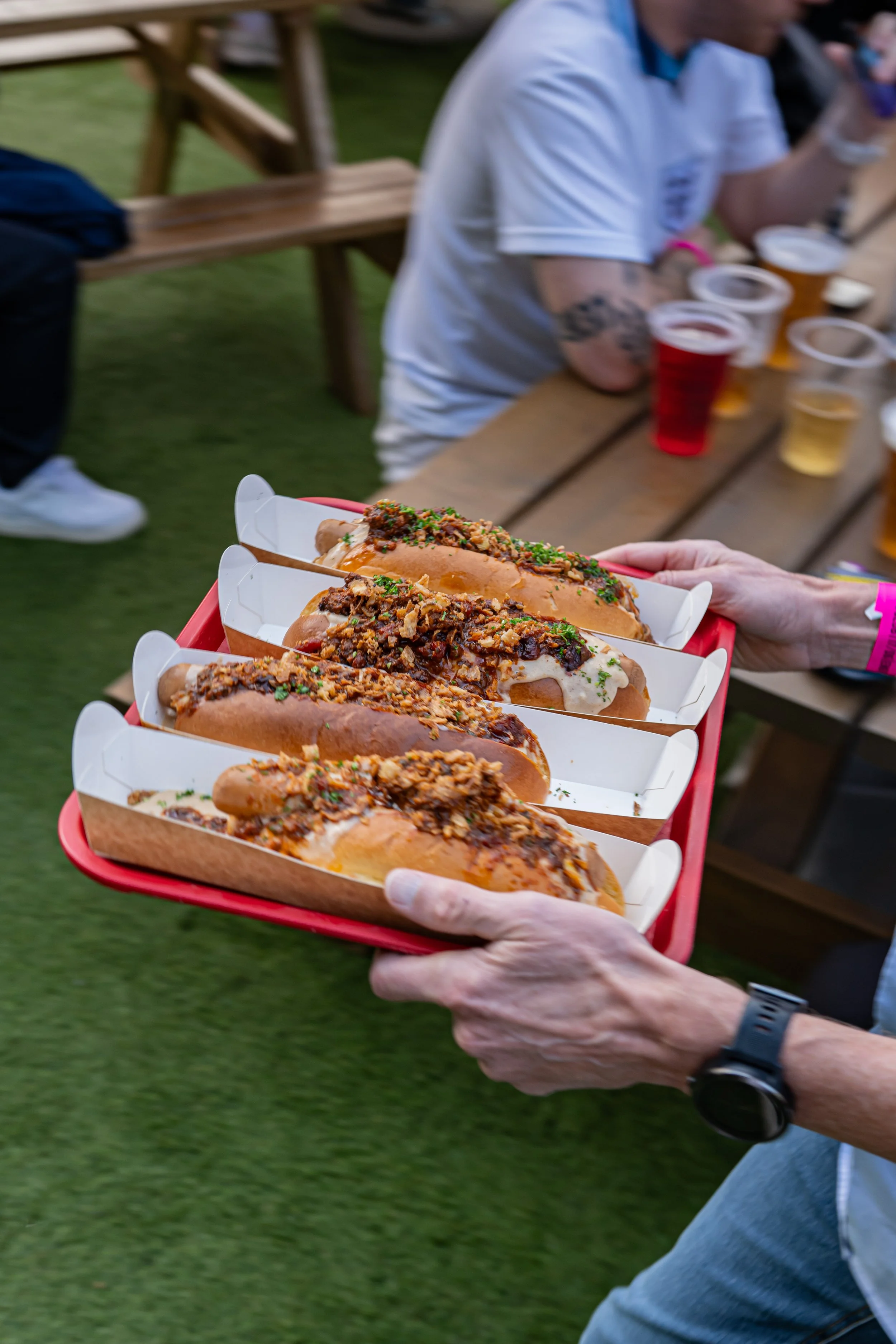 Hot dogs being served at Courts Club Manchester