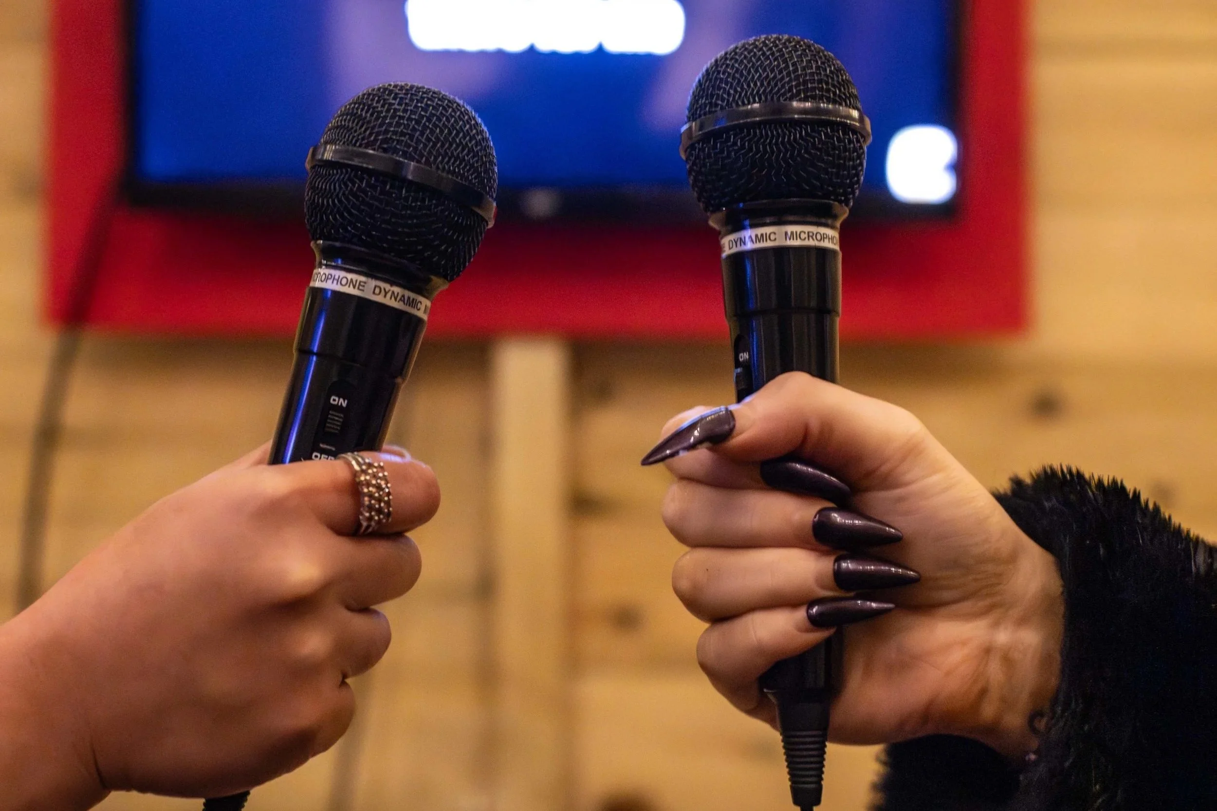 Karaoke microphones inside a private karaoke chalet at Winter Assembly Manchester