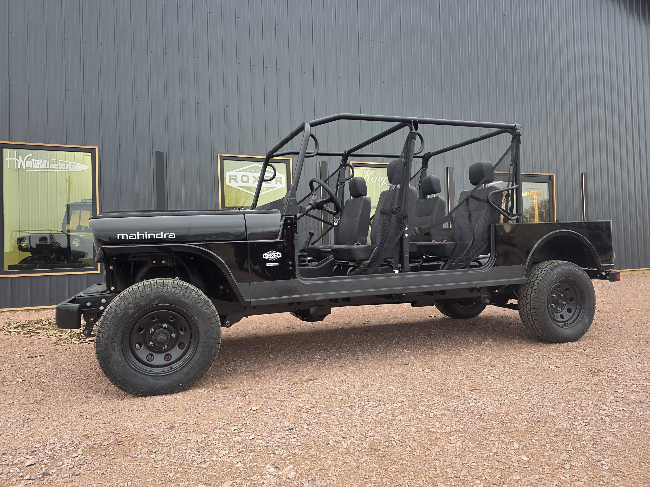 King Series® 4-Door ROXOR diesel utility vehicle with extended steel cab and four-passenger seating