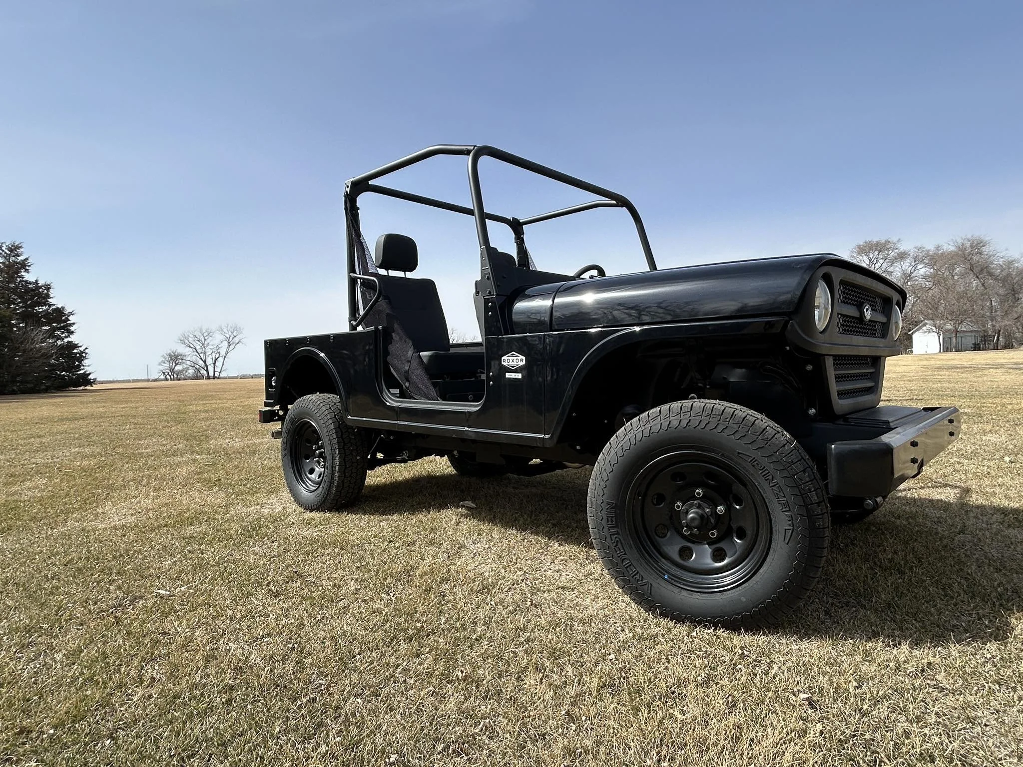 2024 Mahindra Roxor HD Base Model; Price: $22,244; $3,000 CASH DISCOUNT!; Color: Black; steel body, boxed steel frame, heavy-duty transmission, 90A alternator, 16 gal/60.5 liter fuel capacity, 2 year limited warranty, 55 horsepower, side view