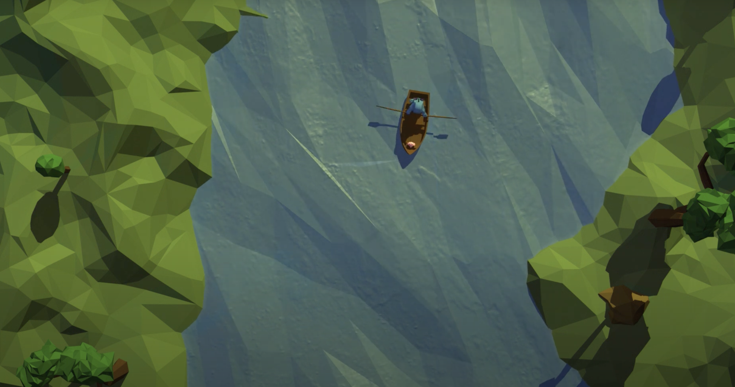 A boat with a person inside rowing in a river surrounded by green trees and cliffs.