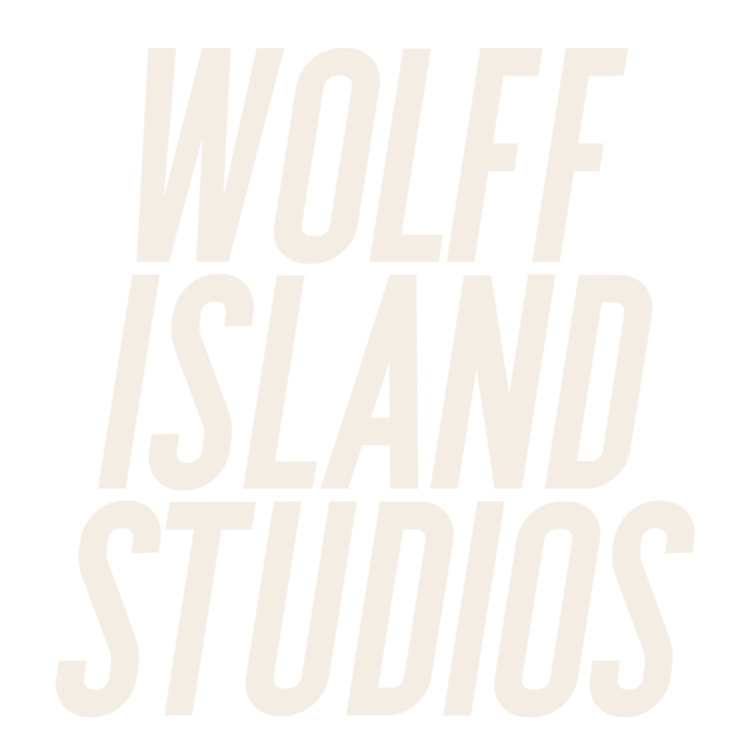 Bold, diagonal text reading 'WOLFF ISLAND STUDIOS' on a black background.