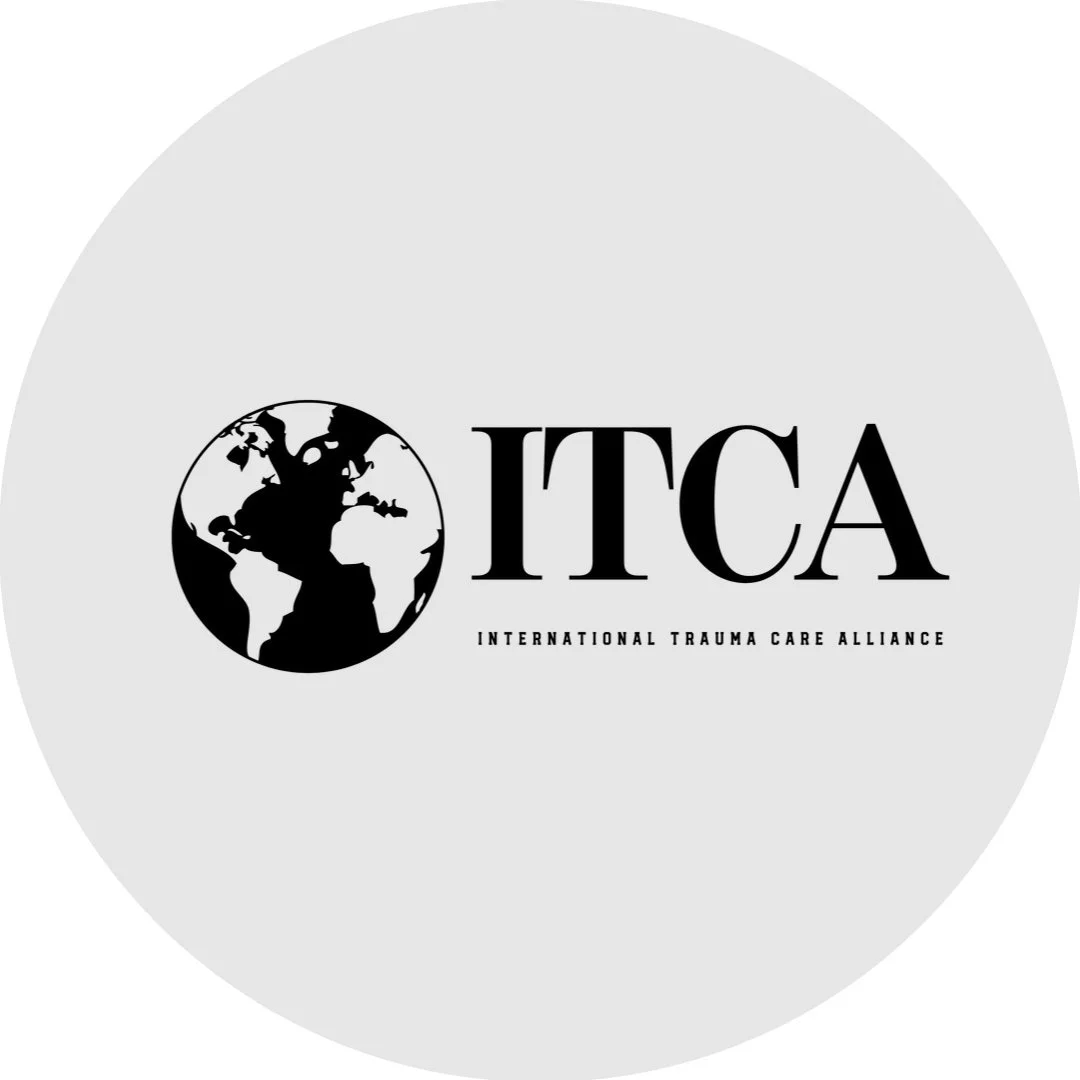 Logo of the International Trauma Care Alliance featuring a black and white globe and the acronym ITCA with the full name underneath.