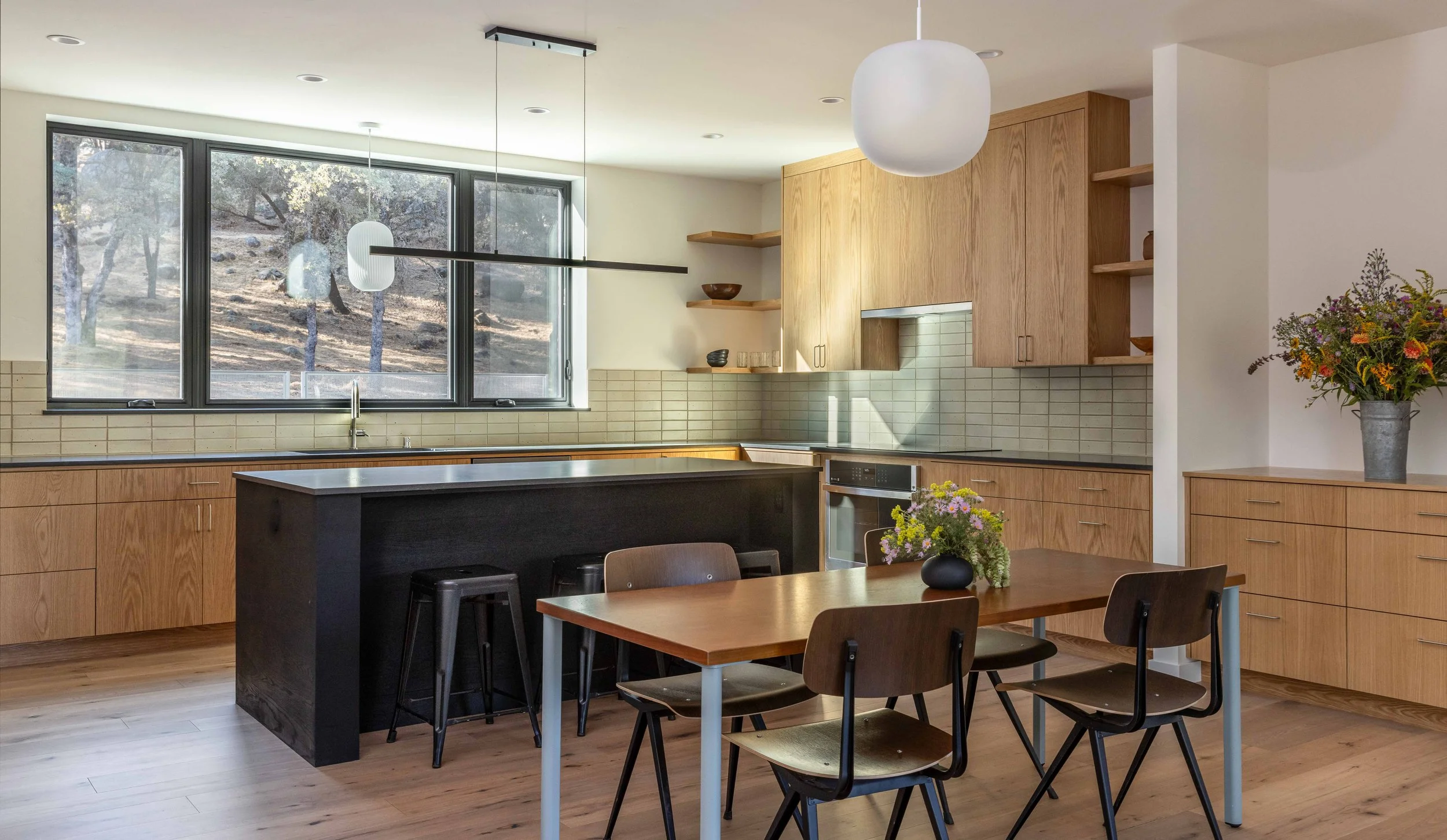 Simple modern kitchen with a black island