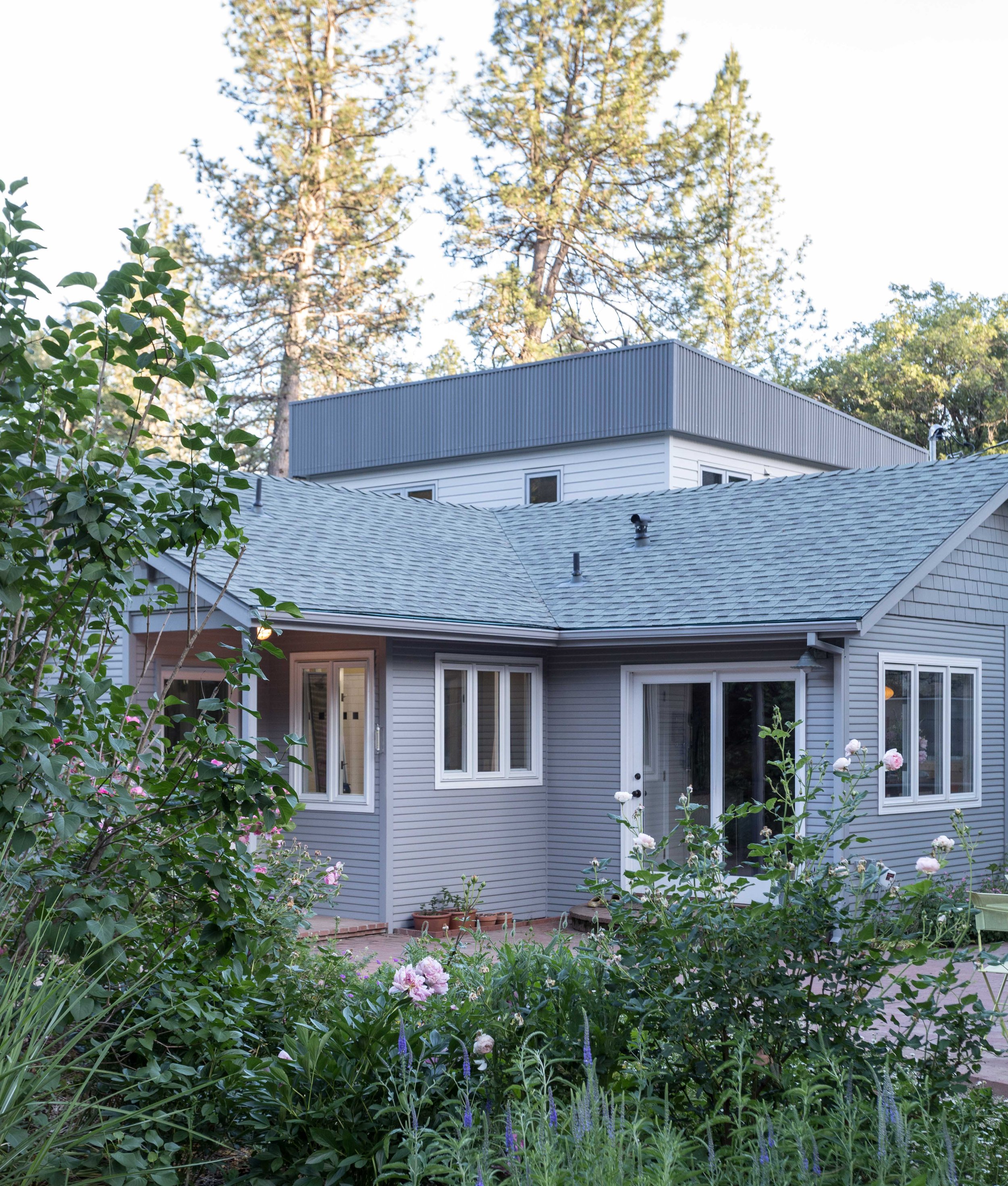 Modern gray house with a garden