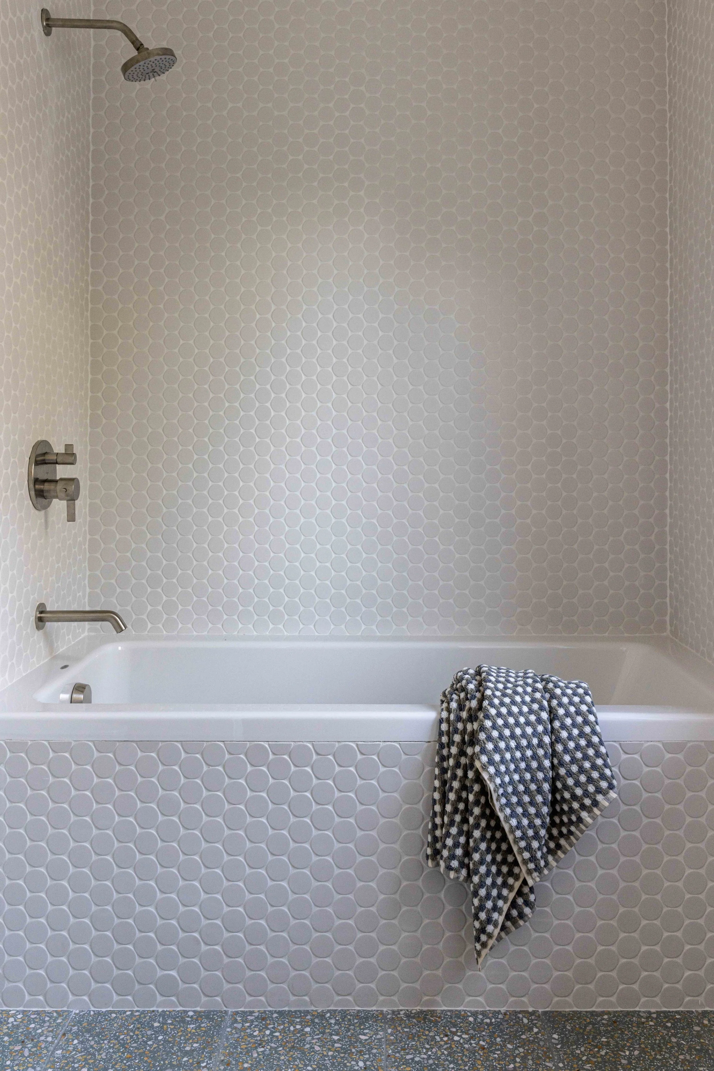 Bathroom with large penny tile