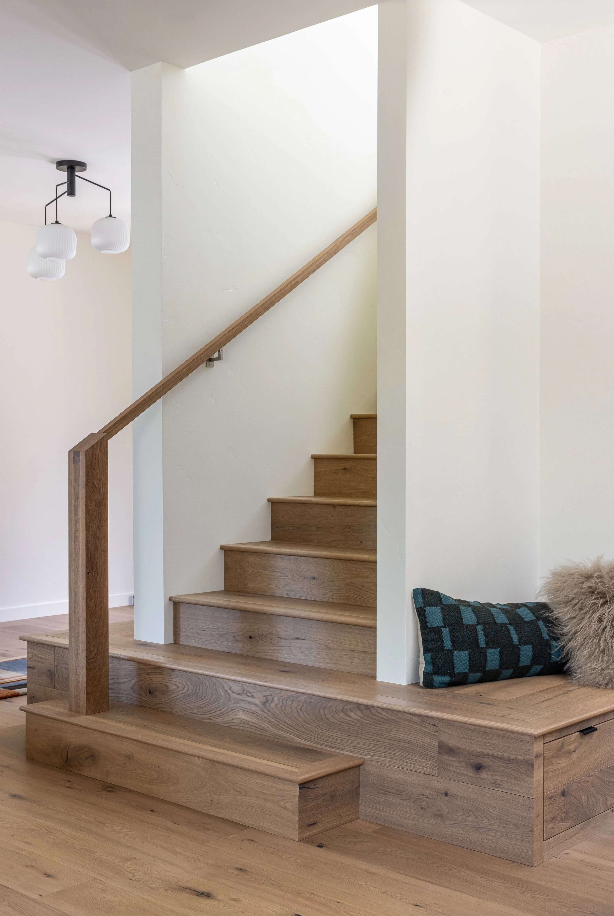 Stairs that wrap around to create a bench