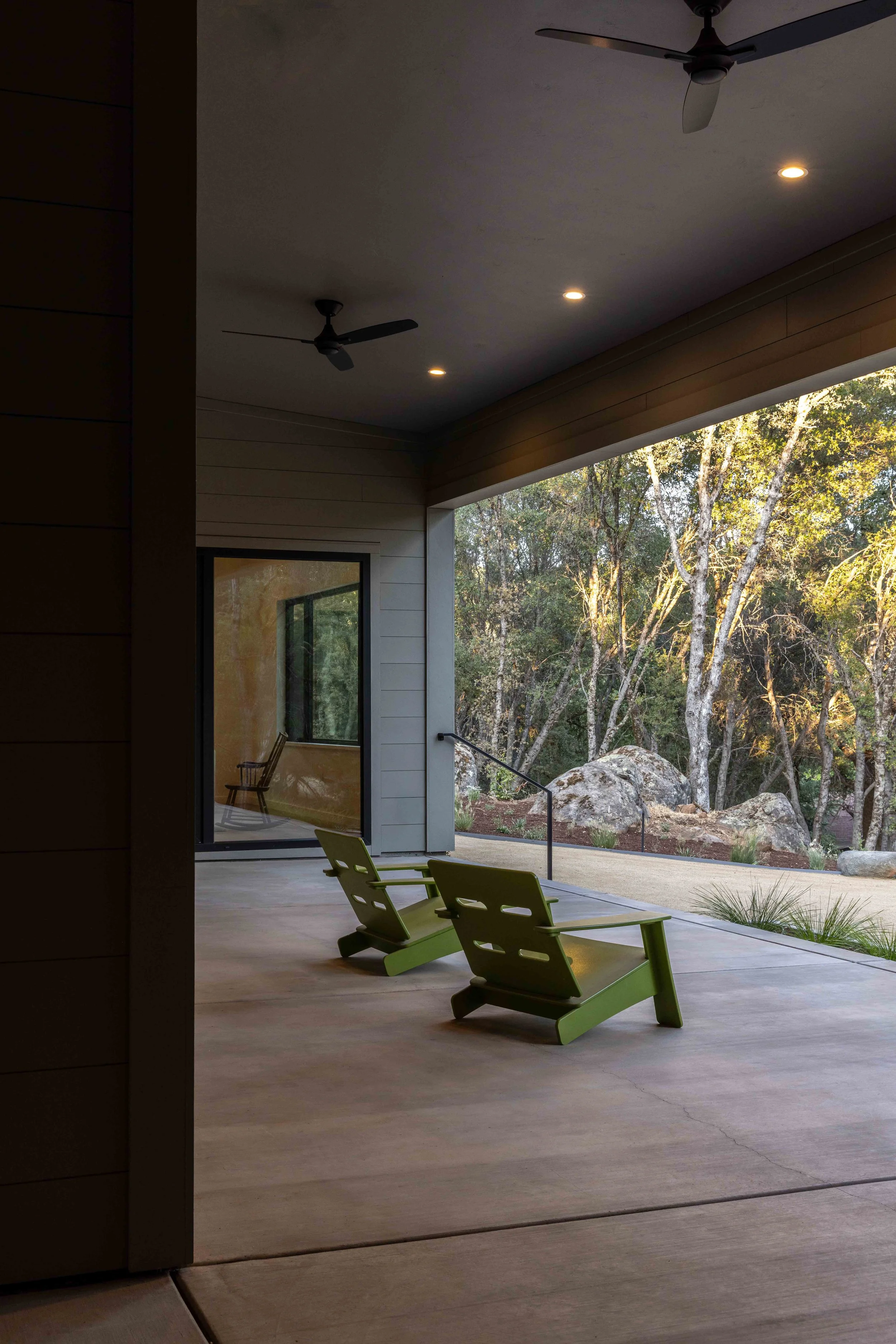 Deep covered porch that connects to landscape