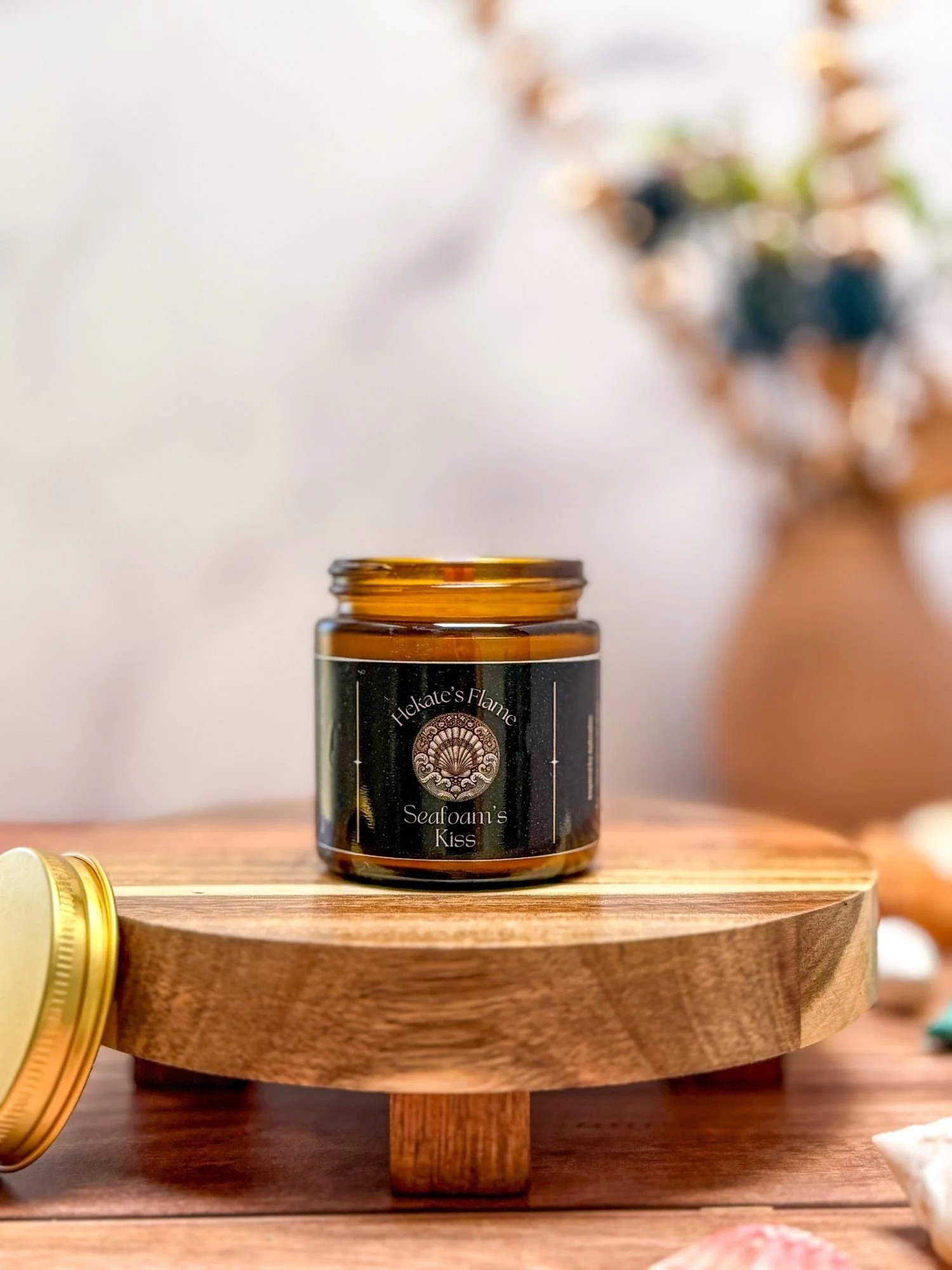 Handmade Aphrodite candle Seafoam’s Kiss, amber glass jar with gold lid, eco-friendly coconut apricot wax wooden wick.