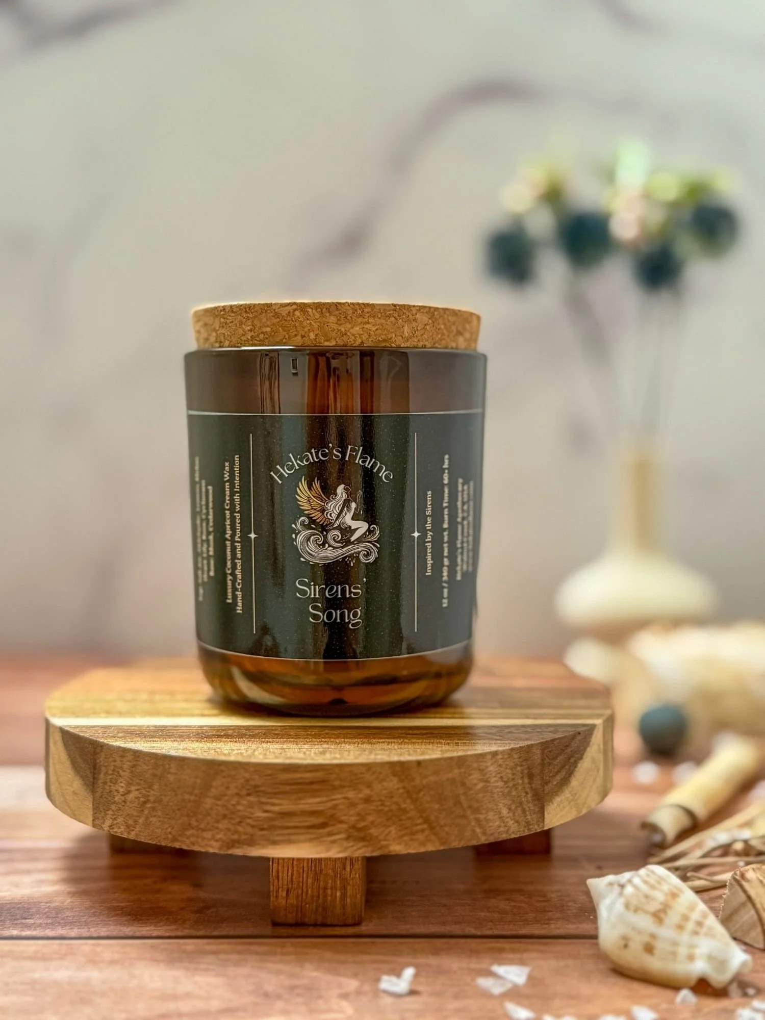 Handcrafted Siren’s Song mythology candle in amber jar with cork lid, inspired by Greek goddess sirens, luxury homemade eco-conscious candle.
