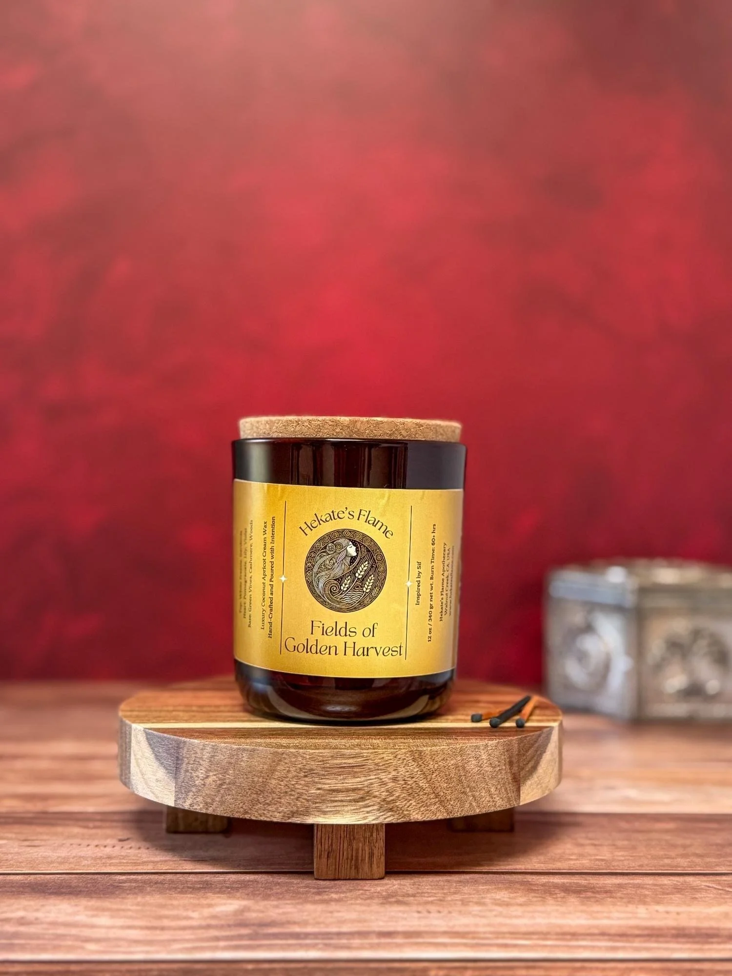 Large amber jar with cork lid, Sif Norse goddess candle, hand-poured coconut apricot wax, luxury myth-inspired decor.